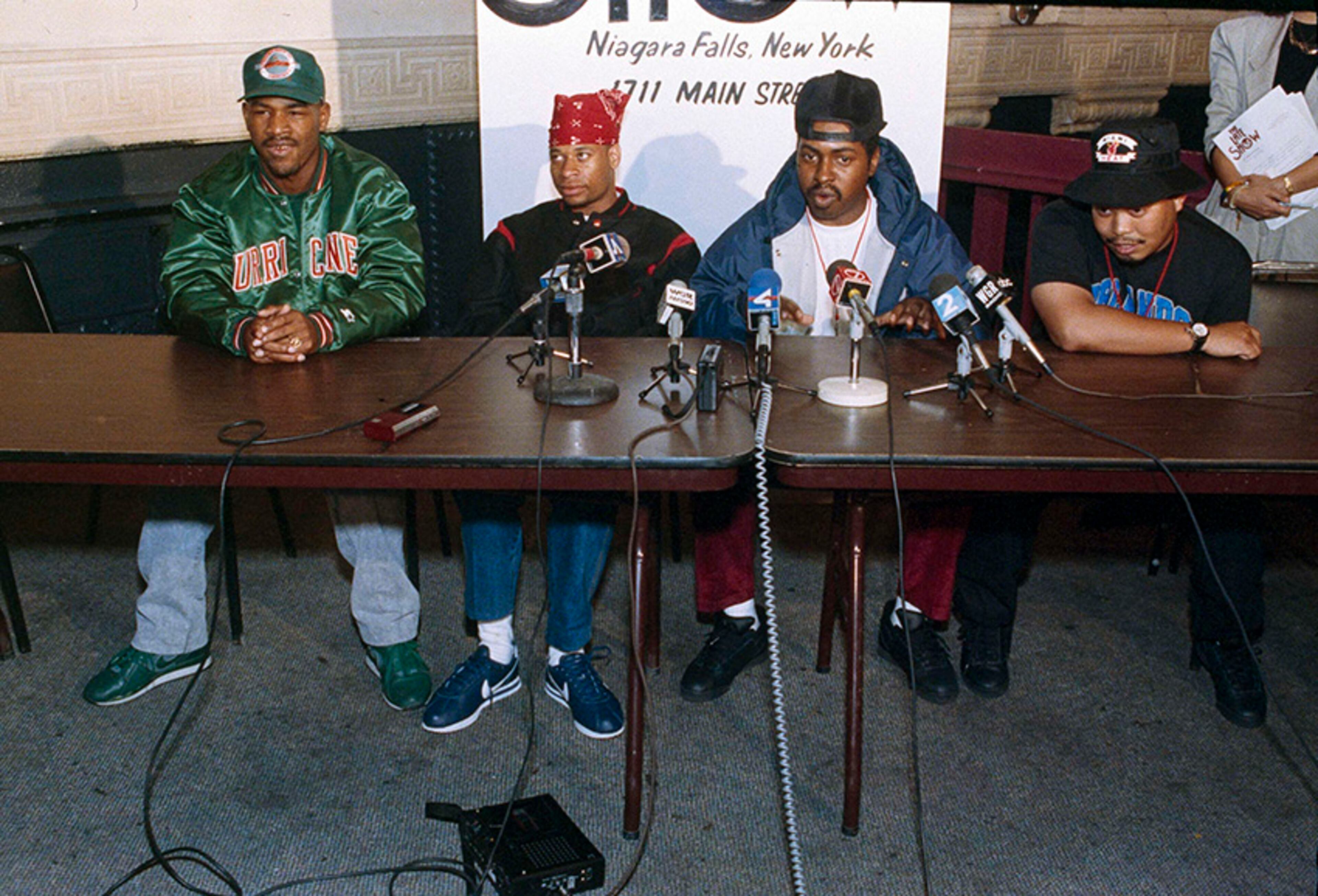 In this Oct. 3, 1990, photo, 2 Live Crew member Mr. Mixx (David Hobbs), second from right, speaks to reporters at the Late Show night club in Niagara Falls, N.Y., while being joined by fellow group members, J.T. Money, left, Brother Marquis, second from left; and Fresh Kid Ice, right. Christopher Wong Won, known as Fresh Kid Ice and a founding member of the Miami hip-hop group 2 Live Crew has died Thursday, July 13, 2017, at a Veterans Affairs hospital in Miami as a result of "medical conditions" he had suffered for several years, the group's manager, DJ Debo, said. He was 53. (AP Photo/Mike Groll, File)