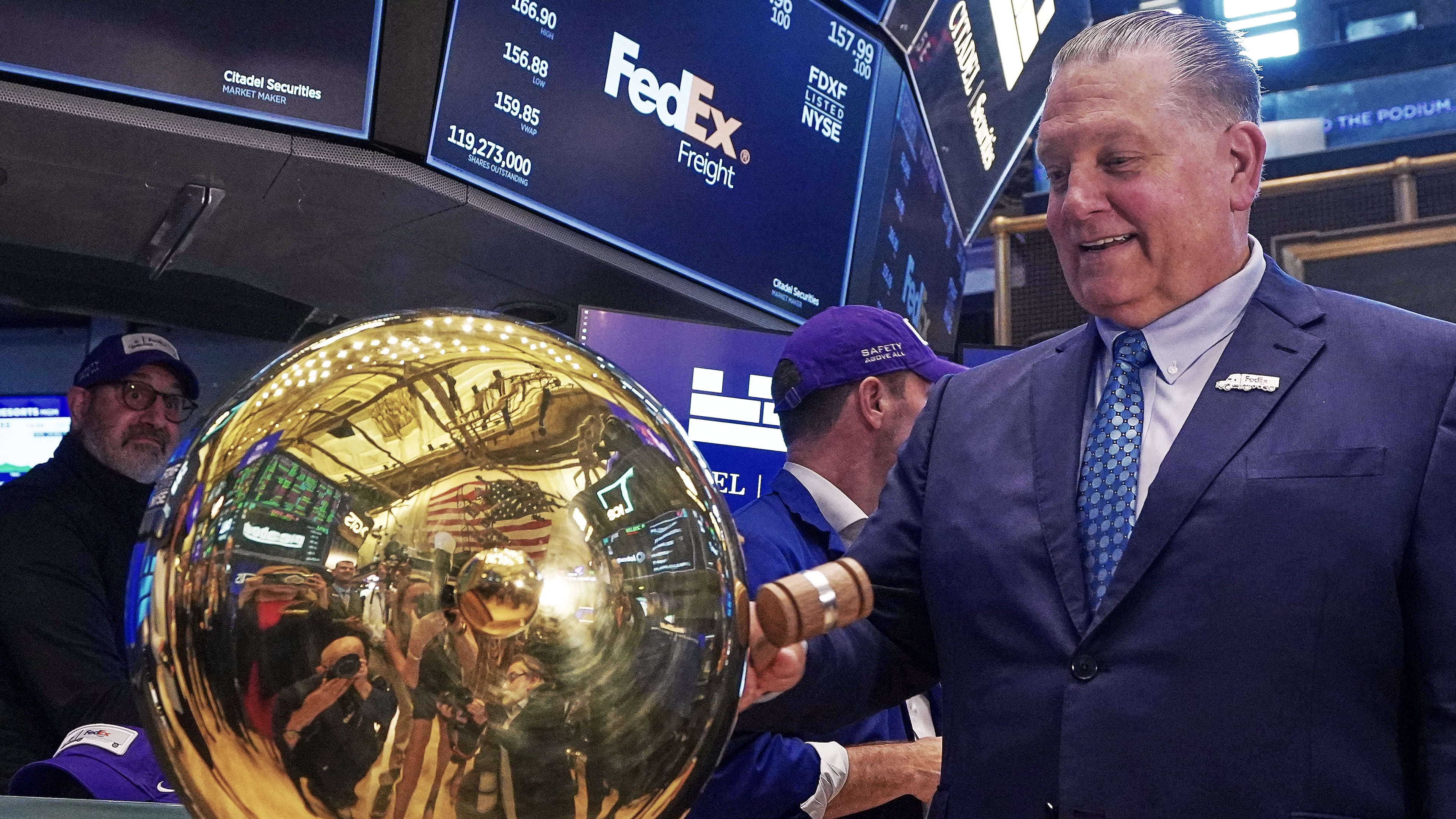 FedEx Freight Holding Company President & CEO John A. Smith rings a ceremonial bell on the floor of the New York Stock Exchange as his company begins trading, Monday, June 1, 2026. (AP Photo/Richard Drew)