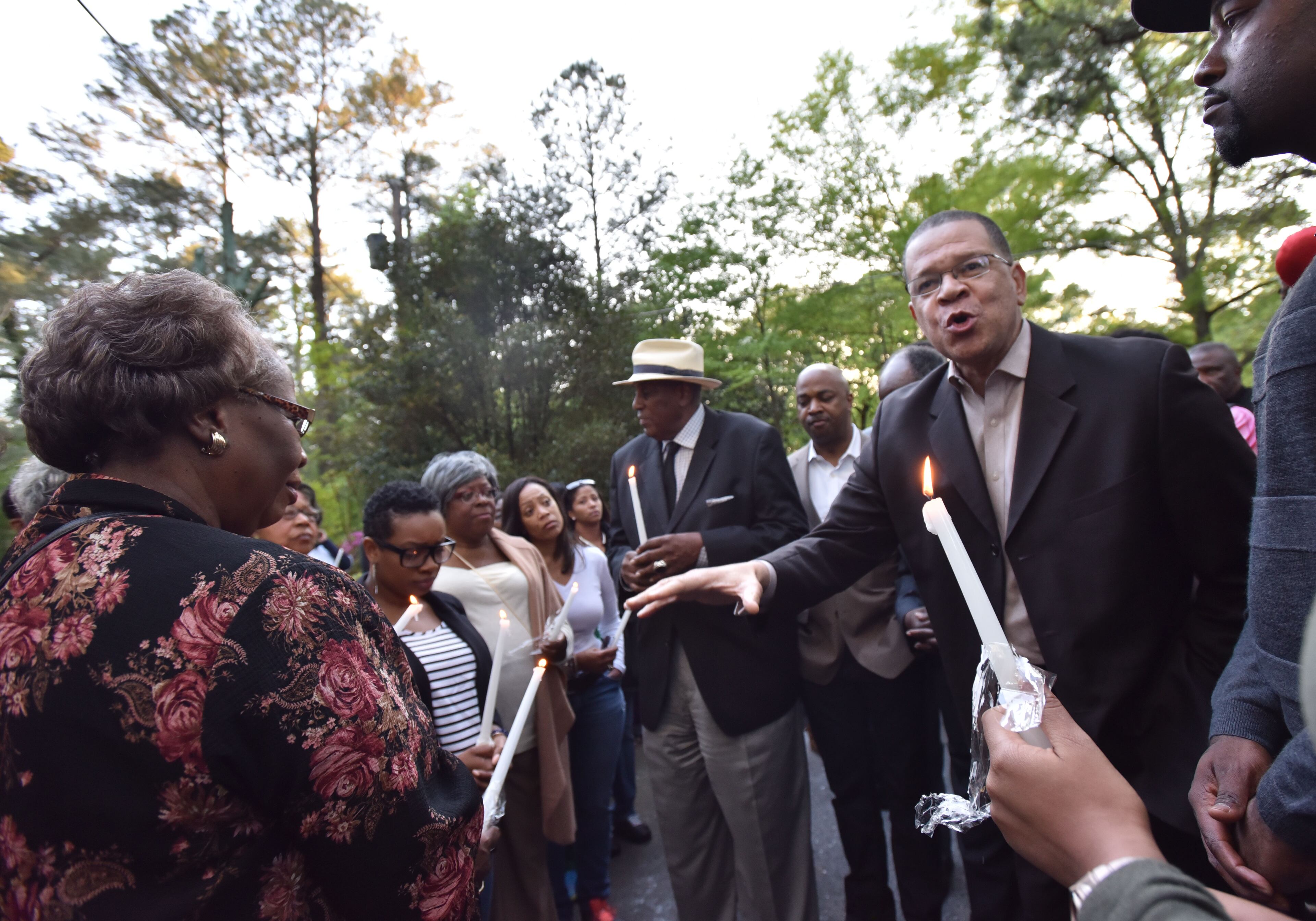 Fulton County Chairman John Eaves speaks to community members during a vigil in honor of Barney Simms and to stand against violence in Bonnybrook neighborhood on Tuesday, April 12, 2016. On Saturday, April 9, well-known community member and leader Barney Simms, was shot and killed in his southwest Atlanta front yard. HYOSUB SHIN / HSHIN@AJC.COM