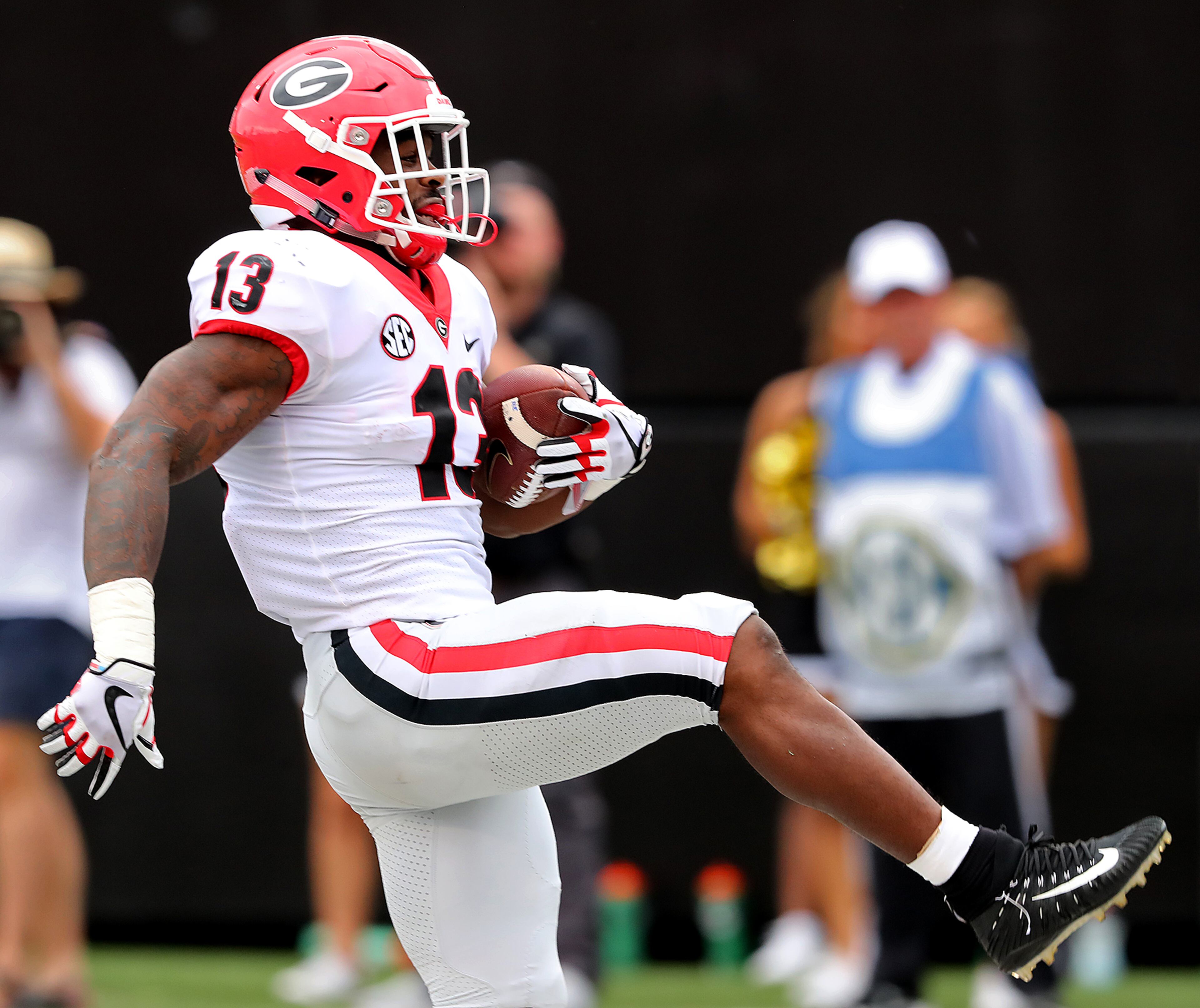 October 7, 2017 Nashville: Georgia tailback Elijah Holyfield high steps into the endzone against Vanderbilt for a touchdown to take a 45-7 lead during the fourth quarter in a NCAA college football game on Saturday, October 7, 2017, in Nashville. Curtis Compton/ccompton@ajc.com