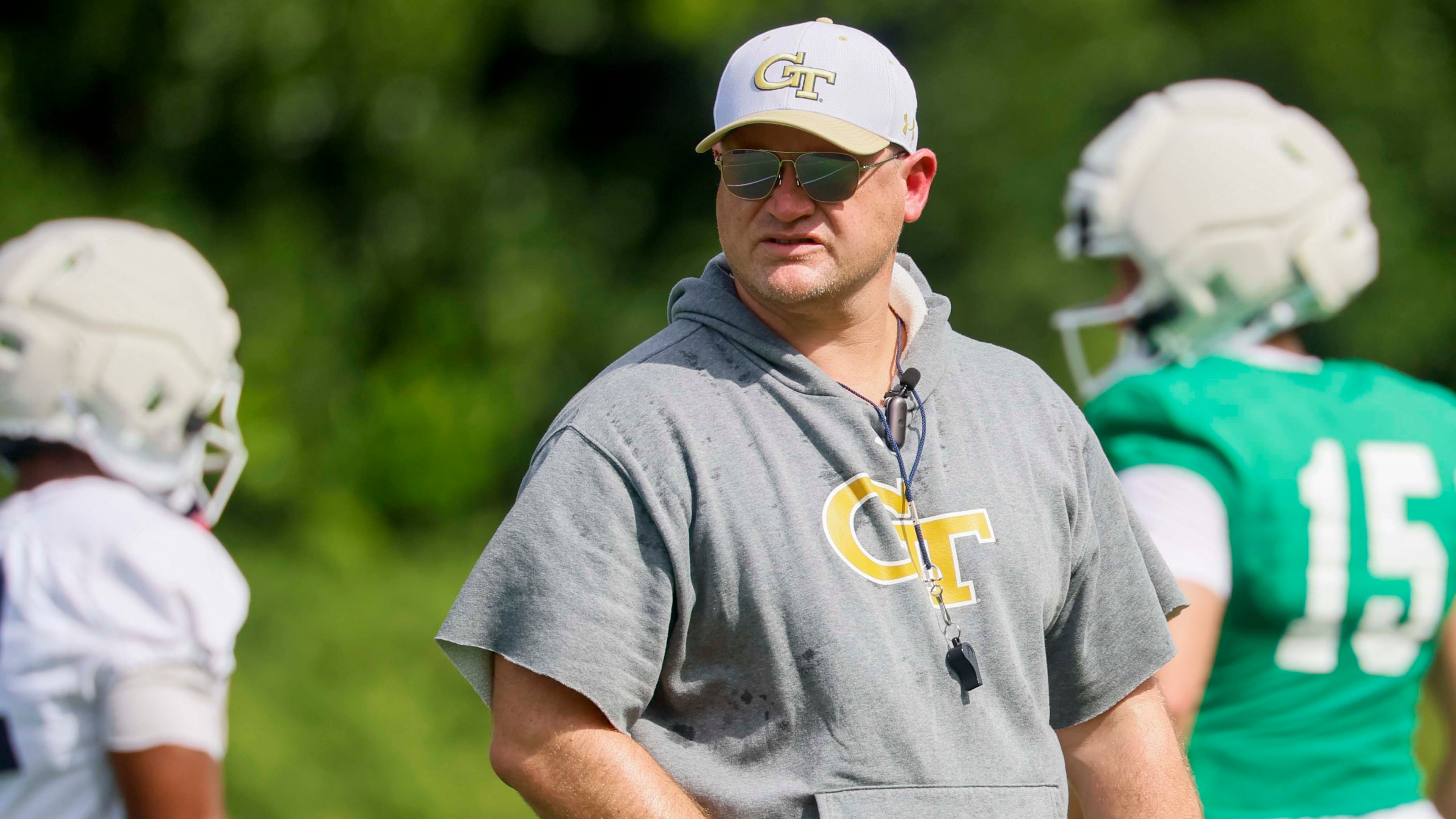 Georgia Tech head coach Brent Key observes the offensive team practicing on the field during the first day of football training at Rose Bowl Field and the Mary and John Brock Football Practice Facility, Monday, August 3, 2026, in Atlanta. (Miguel Martinez/AJC)