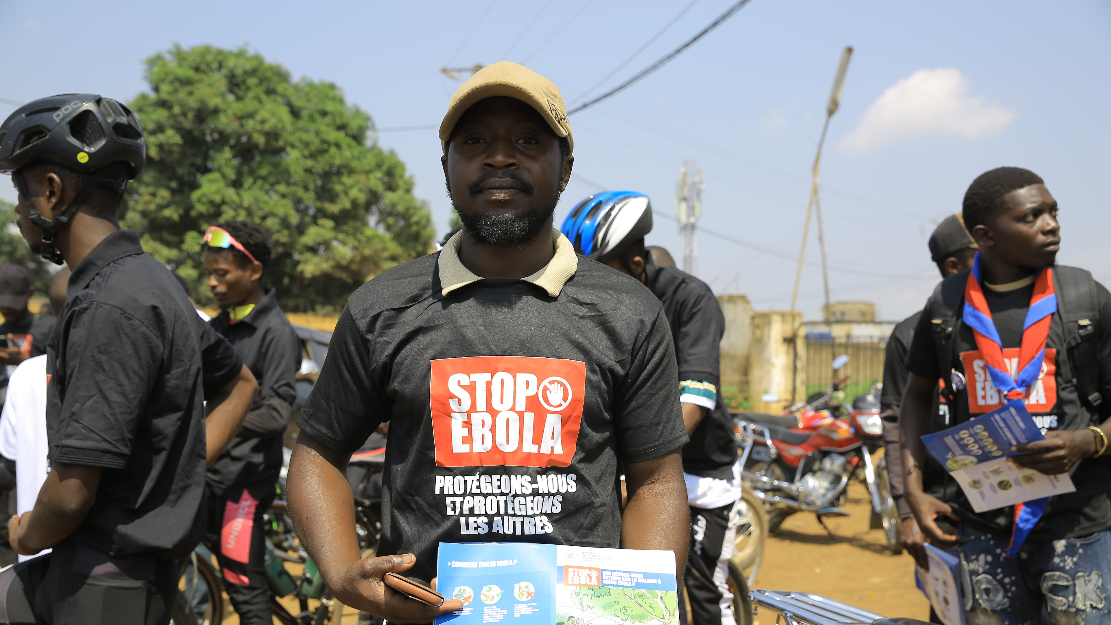 Residents and frontline workers embark on Ebola outbreak awareness campaign in Beni, North Kivu province, eastern Congo, Friday, Aug. 21, 2026. (AP Photo/Sebastien Kitsa Musayi)