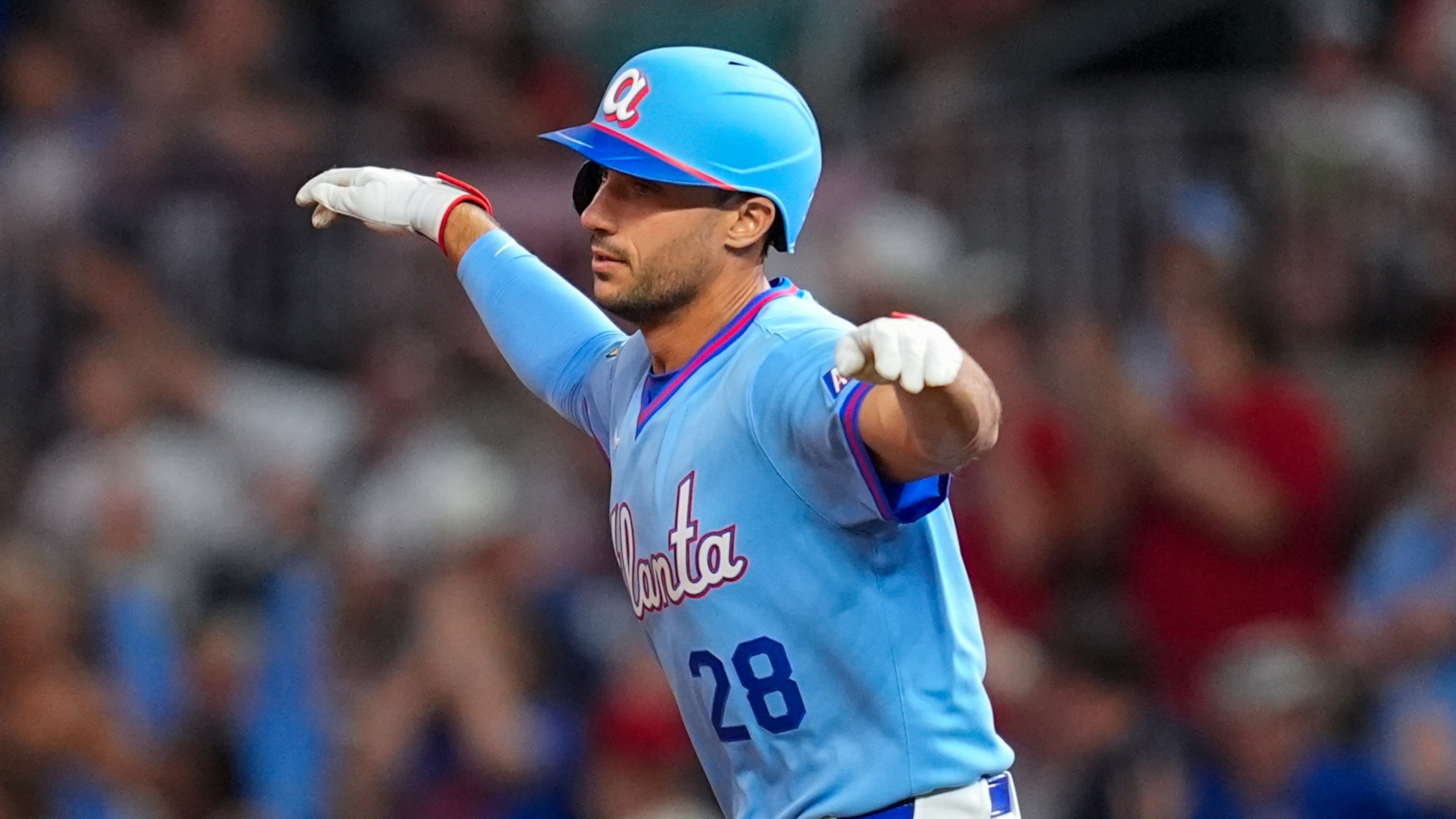 Atlanta Braves' Matt Olson (28) celebrates a two-run homer in the sixth inning of a baseball game against the Cleveland Guardians, Friday, April 10, 2026, in Atlanta. (AP Photo/Mike Stewart)