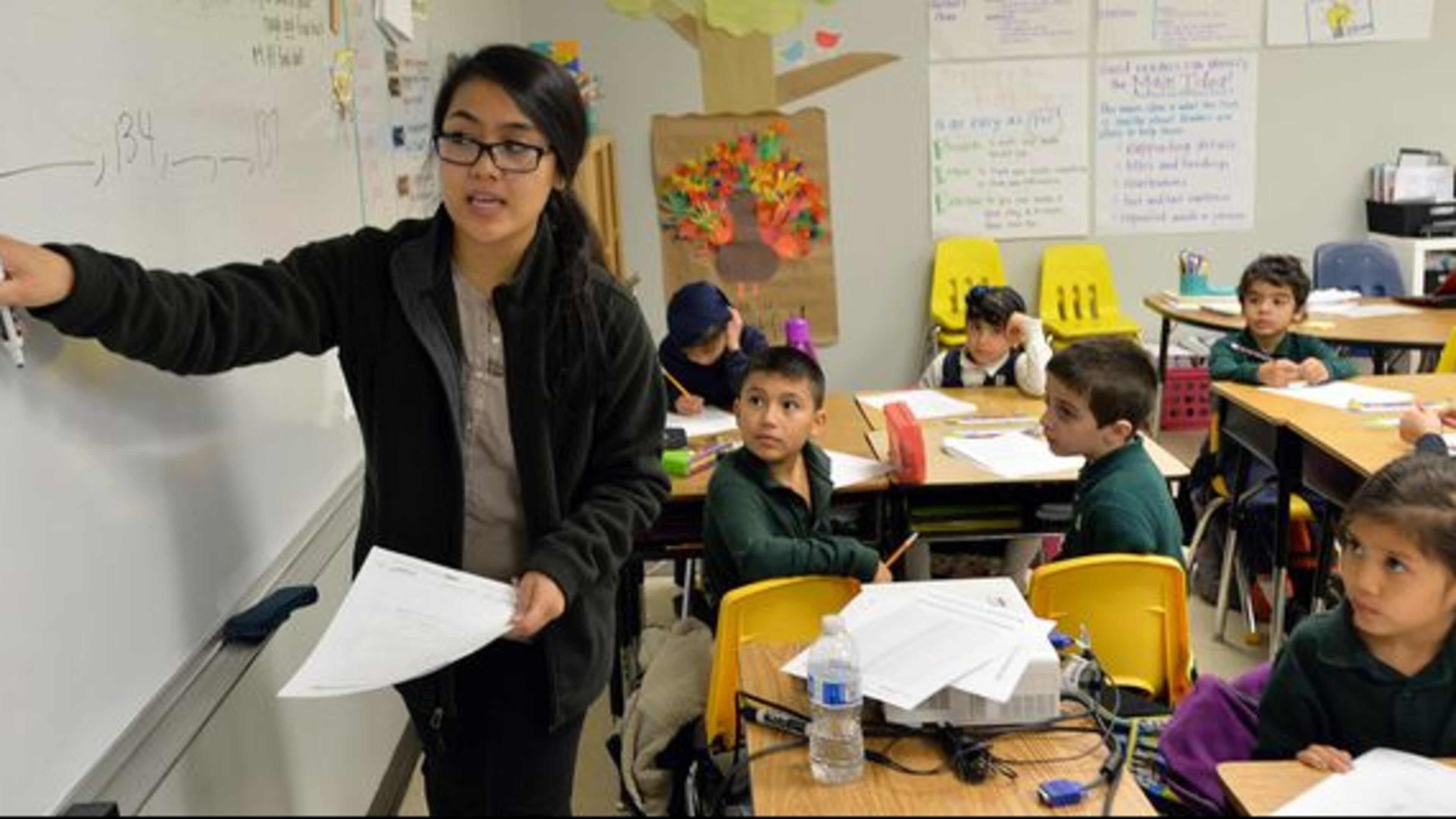Second-grade teacher Dinna Duong teaches her class at Amana Academy in Alpharetta.
