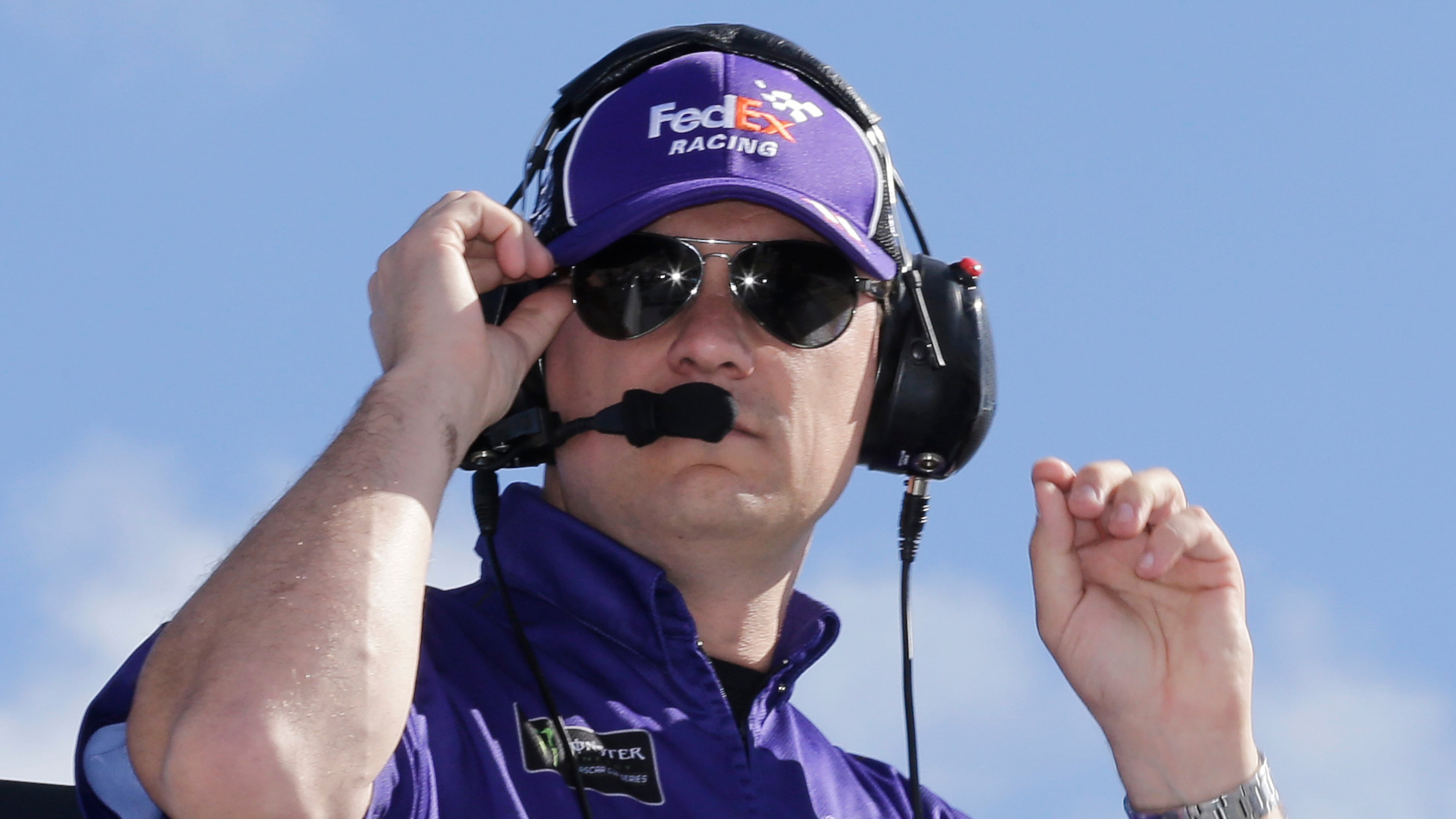 FILE - Christopher Gabehart, crew chief for Denny Hamlin, watches practice for a NASCAR Cup Series auto race on Saturday, Nov. 16, 2019, at Homestead-Miami Speedway in Homestead, Fla. (AP Photo/Terry Renna, File)