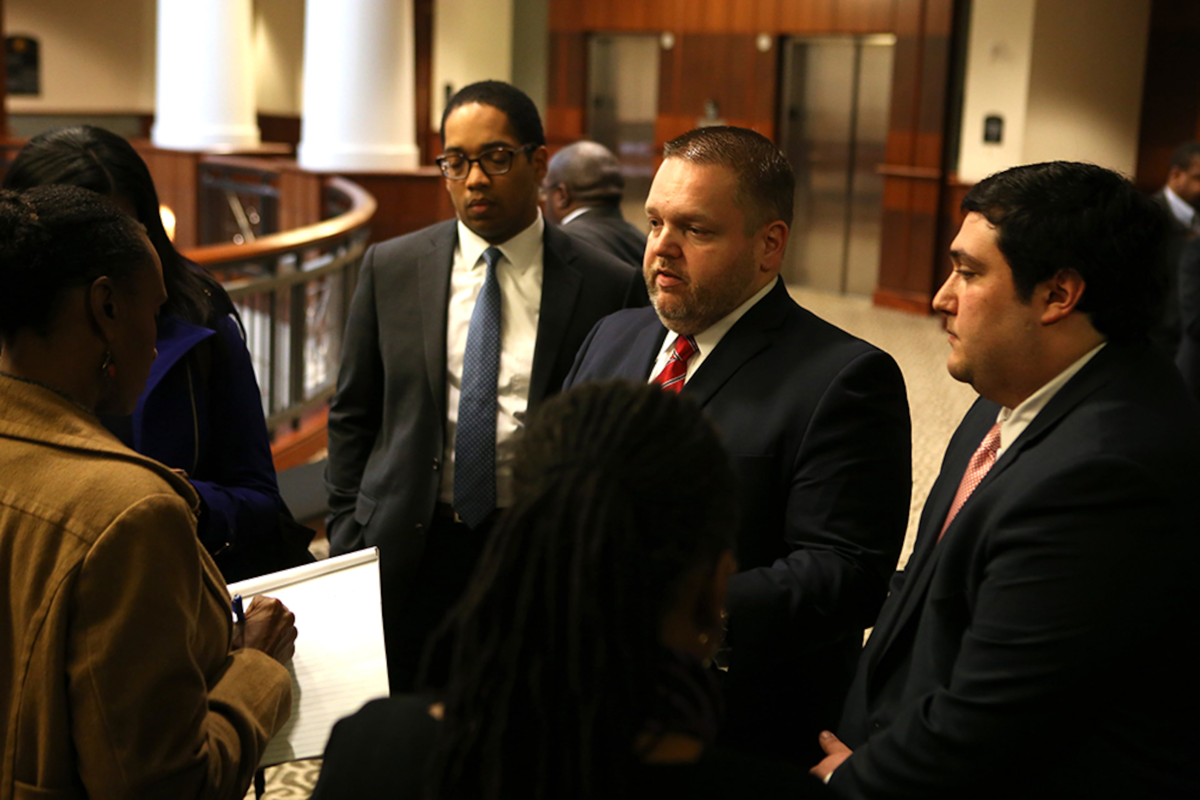 District Attorney Brian Fortner (center) and Assistant District Attorneys David Emadi (right) and Norman Barnett (left) discuss the trial along with events held outside of the court room in Douglasville, Georgia, on Monday, February 27, 2017. District Attorney Fortner noted that following the charges that were held against the group of individuals waving Confederate flags and yelling the n-word, he met with the Sons of Confederate Veterans group to discuss the nature of the charges and that they were not convicting the flag to be what was wrong but the combined circumstances and manner in which it was used. (HENRY TAYLOR / HENRY.TAYLOR@AJC.COM)