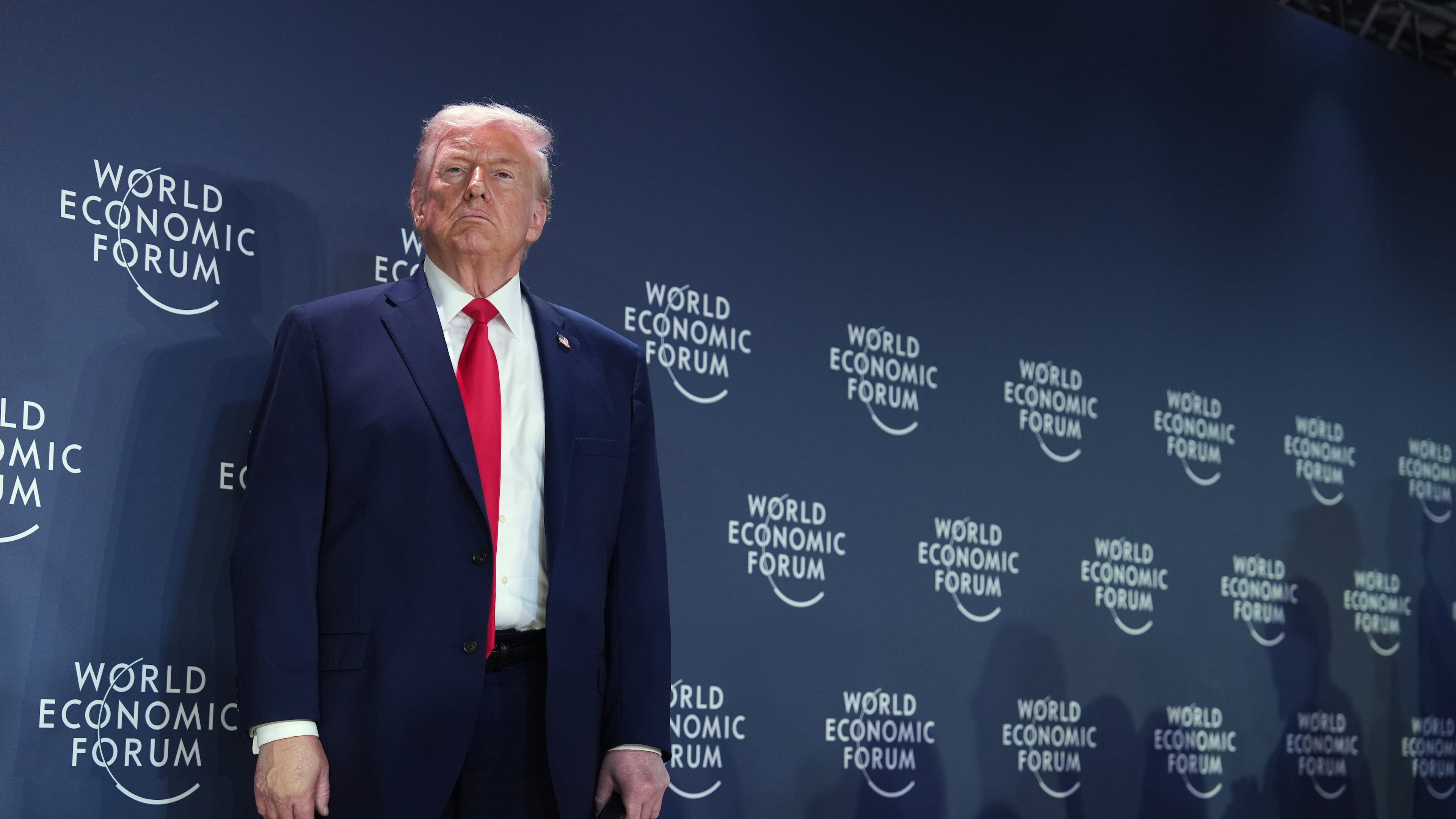 President Donald Trump stands on the stage prior to addressing a meeting of Global Business Leaders at the Annual Meeting of the World Economic Forum in Davos, Switzerland, Wednesday, Jan. 21, 2026. (AP Photo/Evan Vucci)