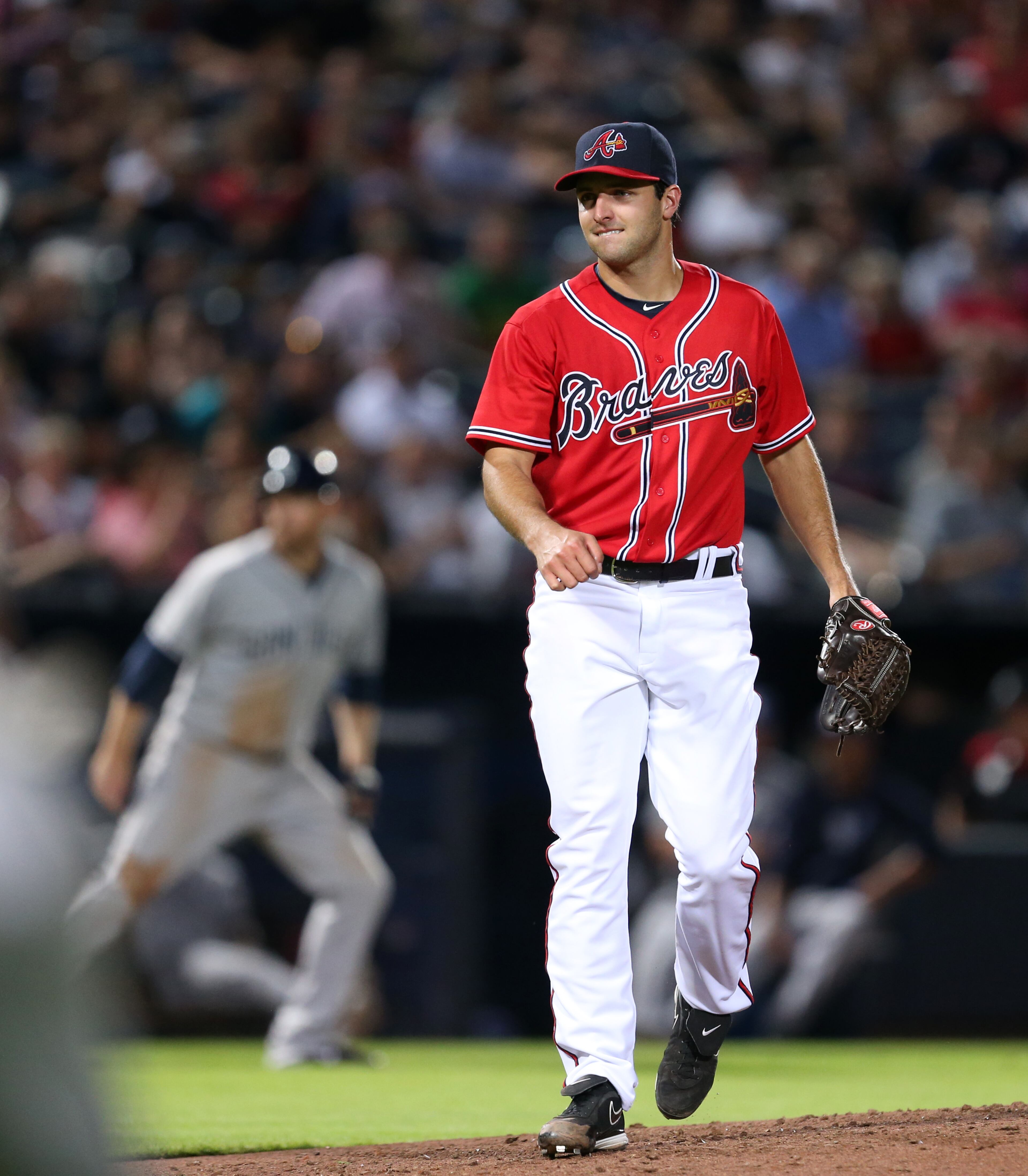 Atlanta Braves David Hale (62) reacts after striking out a San Diego Padres batter ended a scoring threat in the 4th inning of their game at Turner Field Friday night in Atlanta, Ga., September 13, 2013. JASON GETZ / JGETZ@AJC.COM
