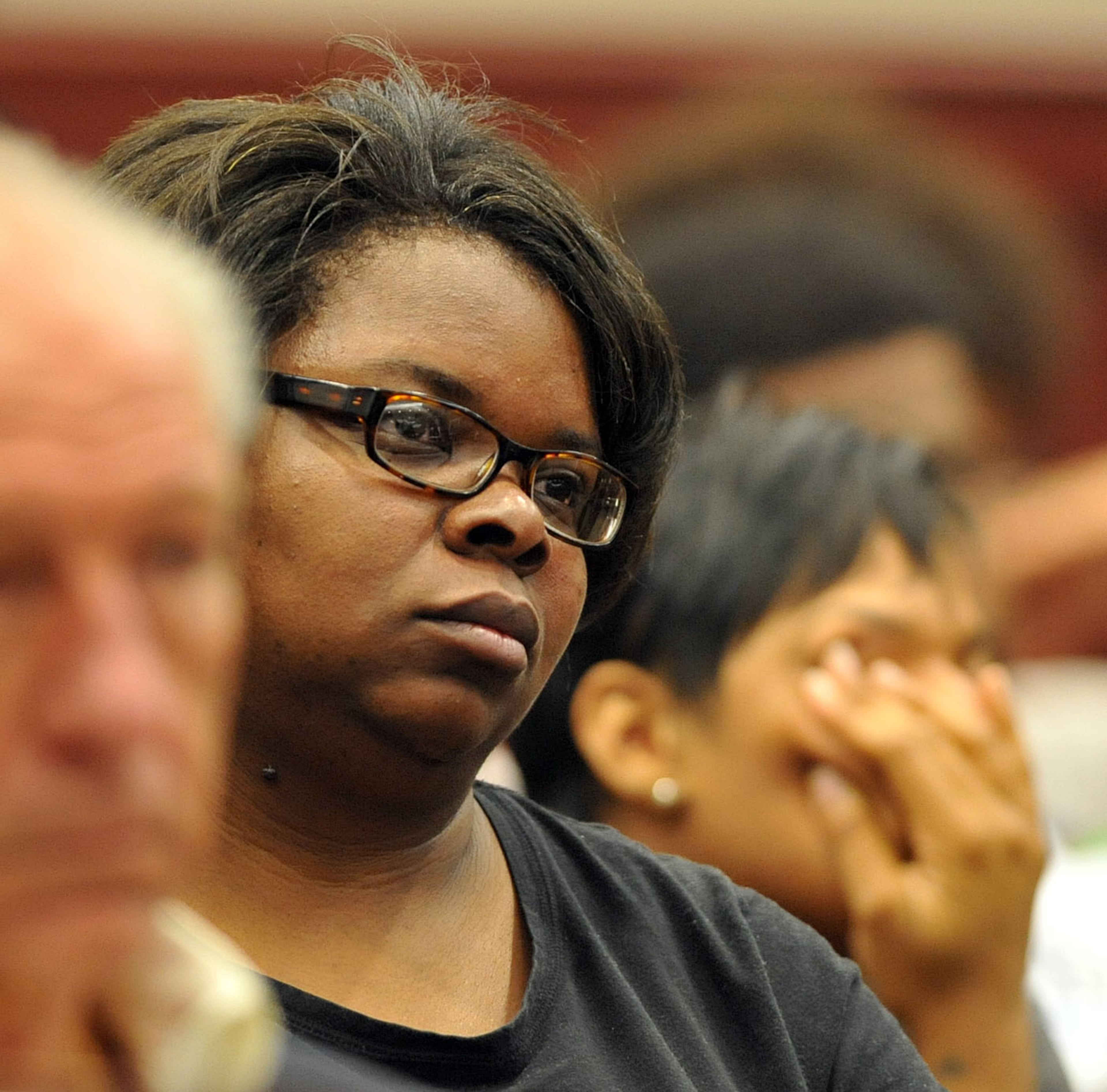 April McAlister, Jazmin Green's mother, listens as Judge Simmons hands down the sentences.