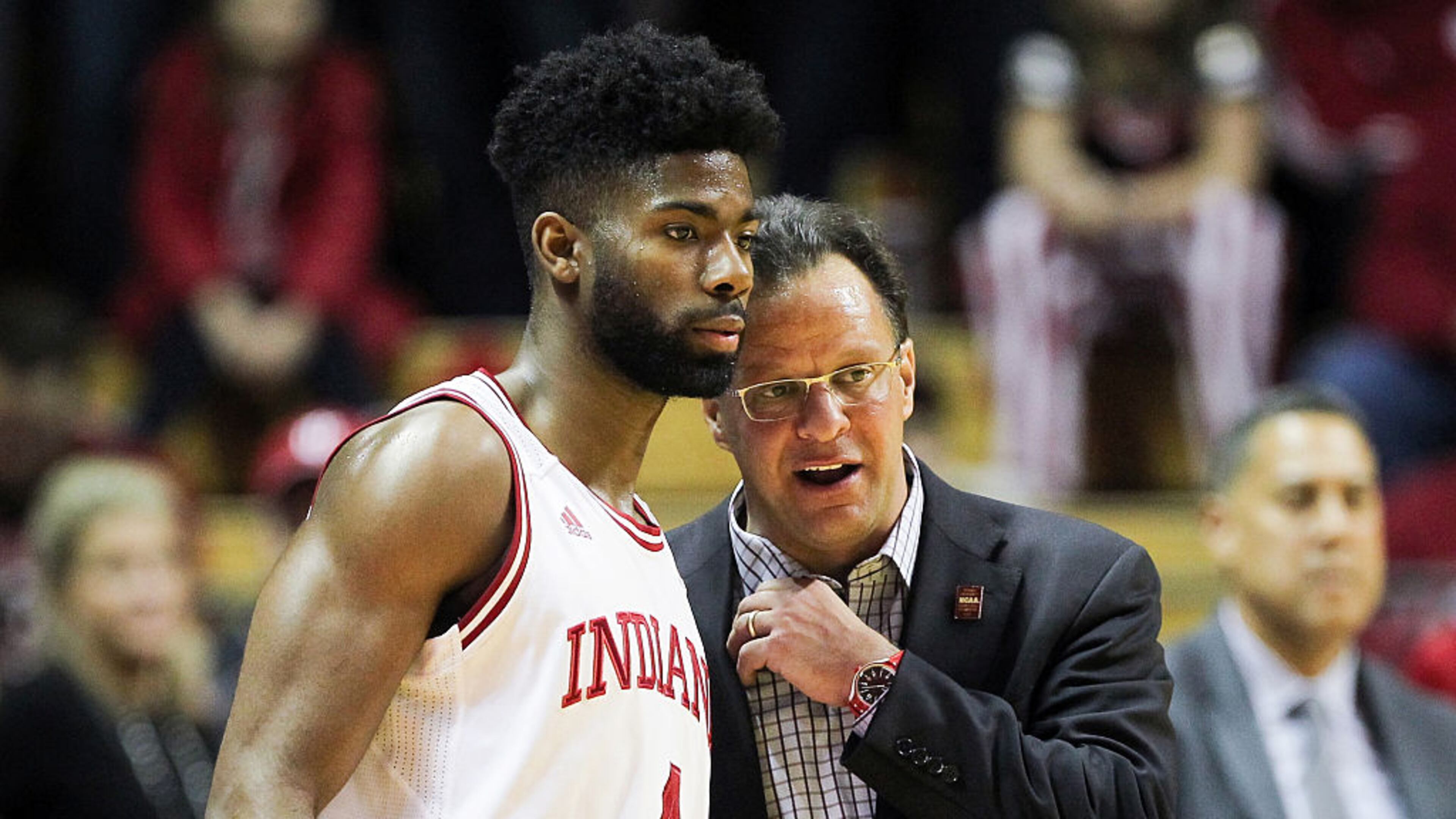 Head coach Tom Crean of the Indiana Hoosiers talks with Robert Johnson #4 in the second half against the Nebraska Cornhuskers at Assembly Hall on December 28, 2016 in Bloomington, Indiana. (Photo by Dylan Buell/Getty Images)