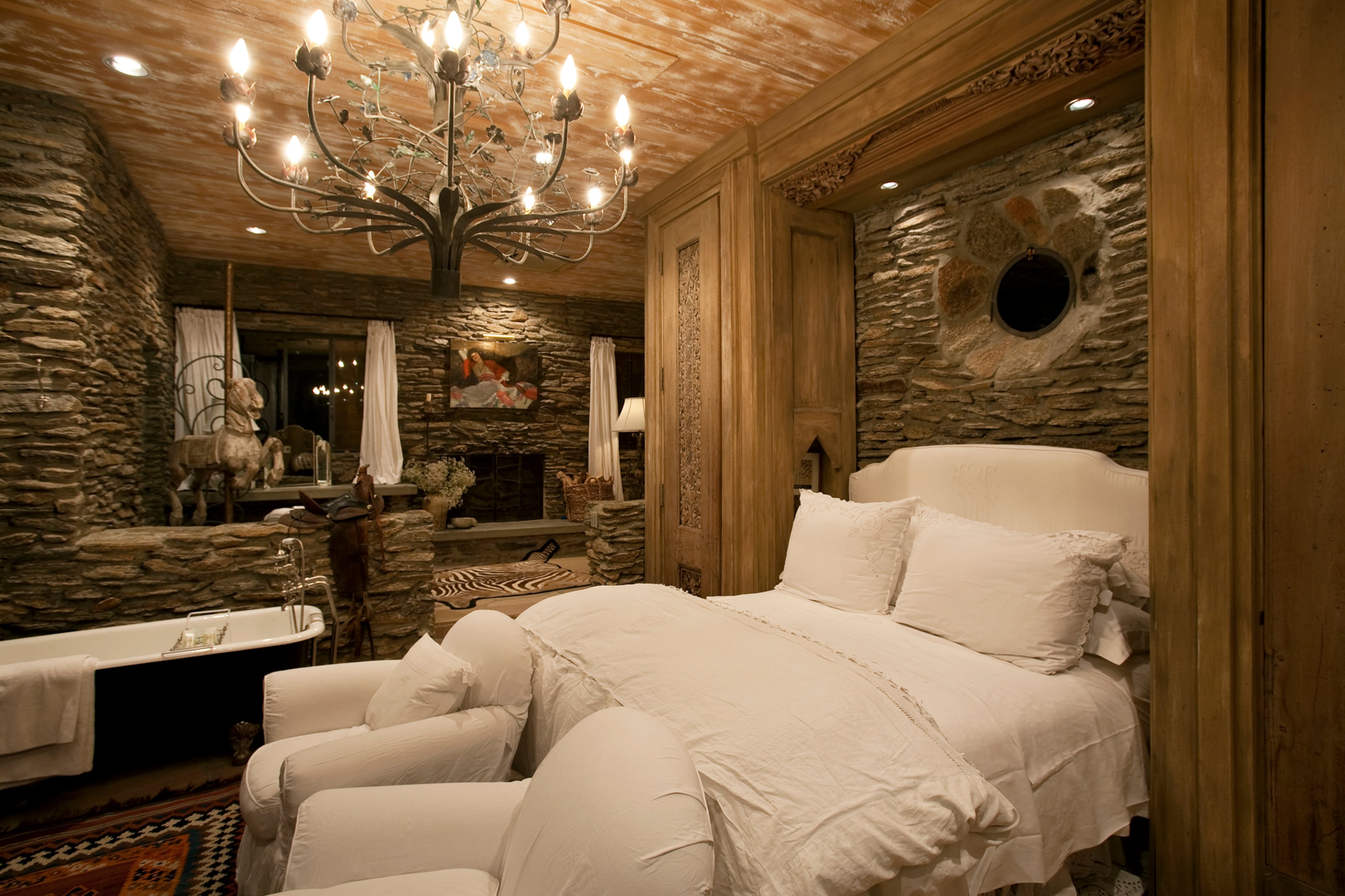 "Three's Company" and "Step by Step" star Suzanne Somers and her husband, TV host Alan Hamel, are selling their secluded Palm Springs compound for $14.5 million. The 73-acre retreat includes five buildings with 10,000 square feet of pavilions. The property also features a wine cellar, an outdoor amphitheater, a dance floor, a spa, hiking trails and a natural waterfall. The estate can't be accessed by car. For more information, visit http://www.toptenrealestatedeals.com/homes/weekly-ten-best-home-deals/2013/12-24-2013/.