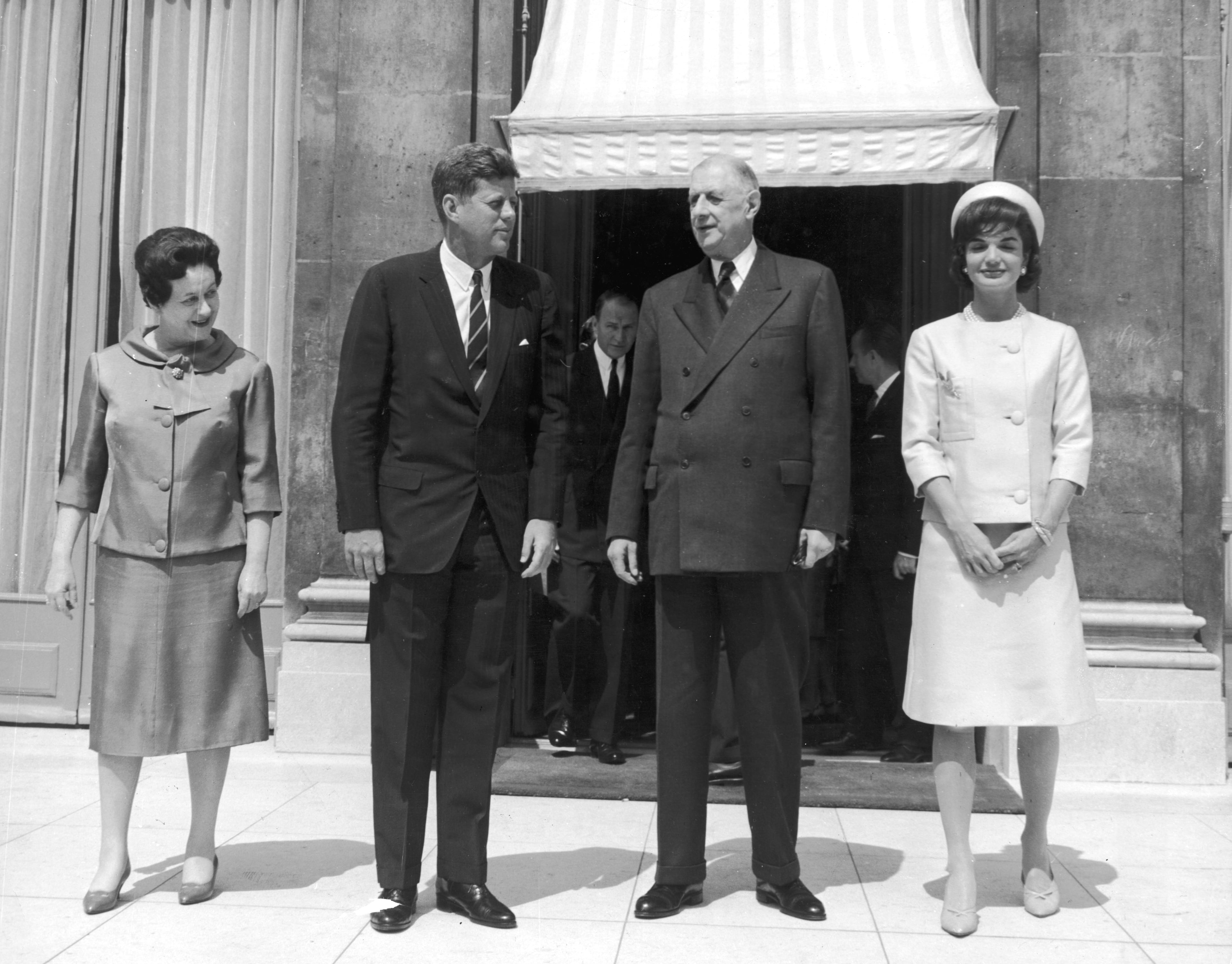 French First Lady Madame de Gaulle, President John F. Kennedy, French President Charles de Gaulle, and American first lady Jacqueline Kennedy stand outside the Elysee Palace, Paris. Mrs. Kennedy took France by storm. (Express Newspapers/Getty Images)