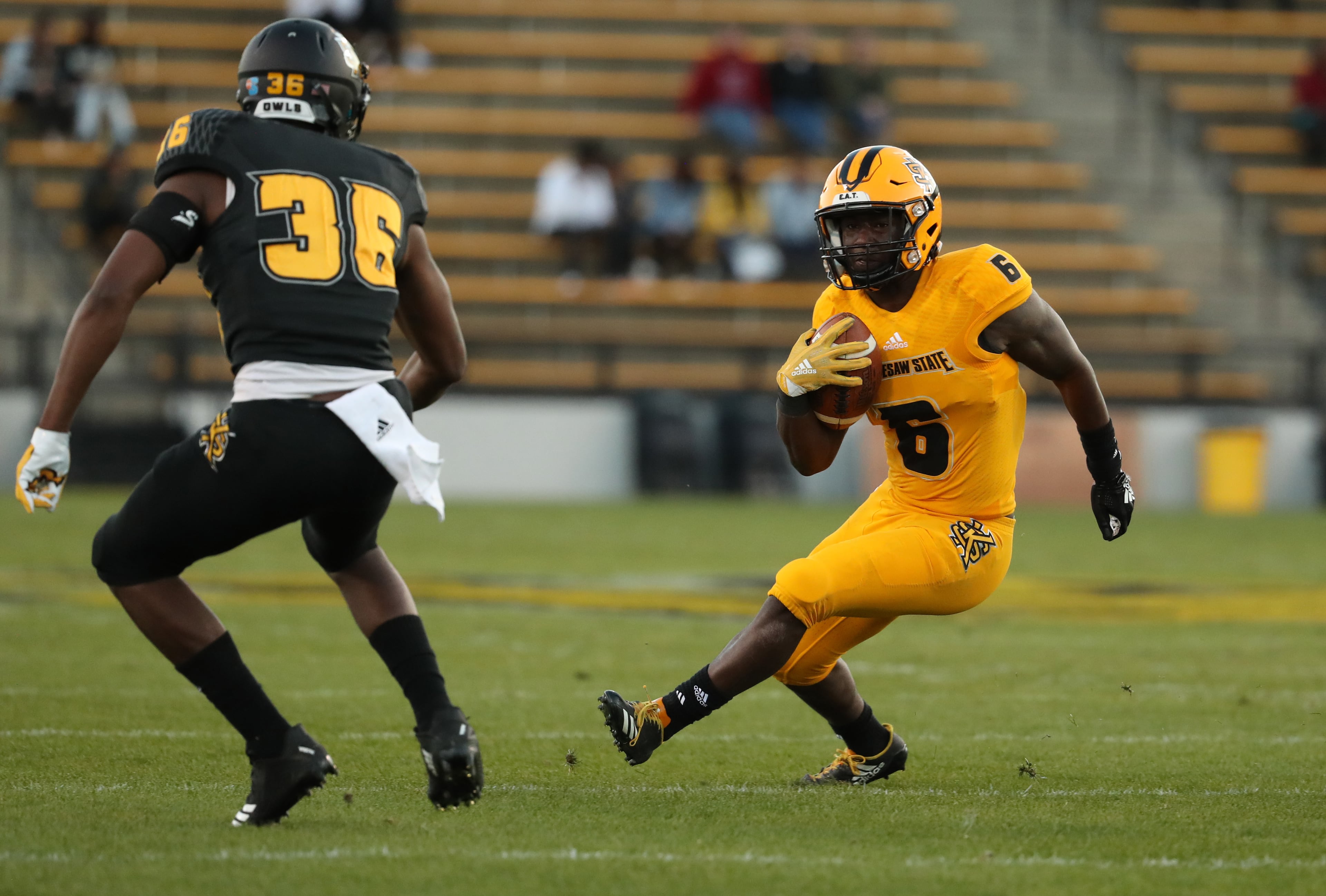 March 22, 2019 - Kennesaw, Ga: Kennesaw State Owls running back TJ Reed (6) runs for yards during the KSU spring football game at Fifth Third Bank Stadium Friday, March 22, 2019 in Kennesaw, Ga.. (JASON GETZ/SPECIAL TO THE AJC)