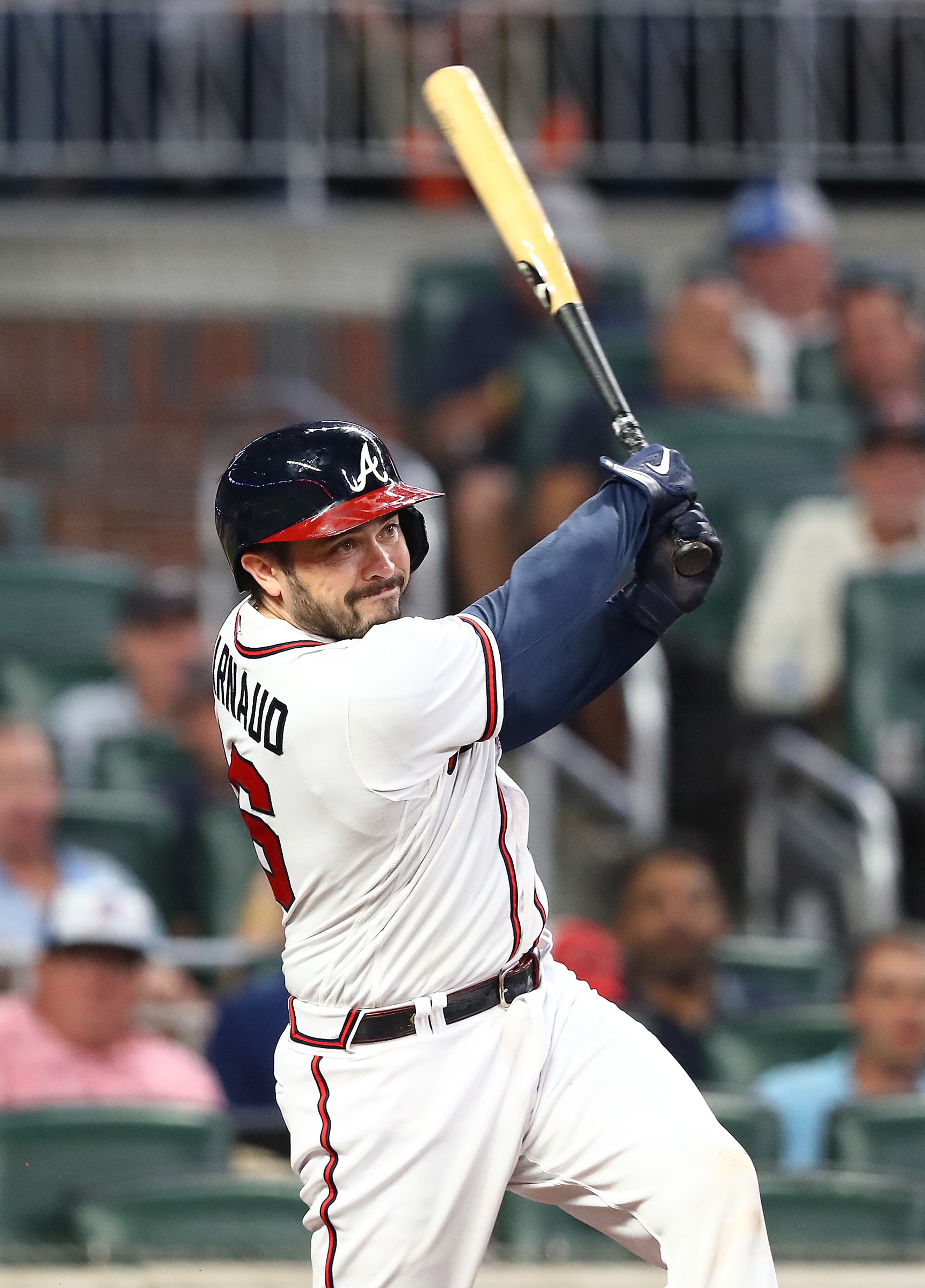 Braves catcher Travis d'Arnaud hits an RBI single, giving his team a 2-1 lead over the Nationals during the fourth inning Monday night at Truist Park. (Curtis Compton / Curtis Compton@ajc.com)