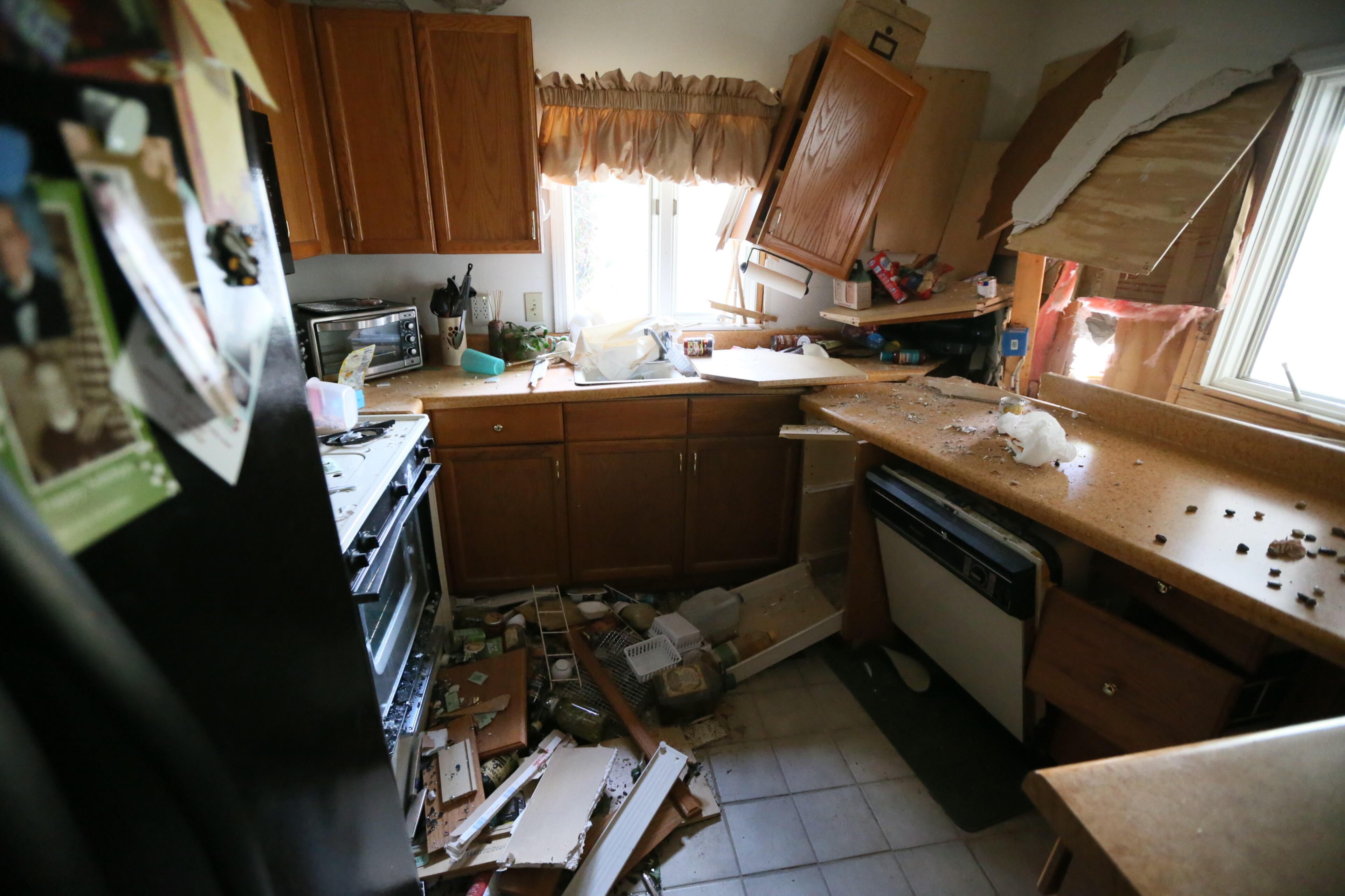 Channel 2 Action News reported that when officers tried to stop a motorist driving with no lights around 2 a.m., the driver sped off. Officers initiated a chase, but had called it off due to high speeds before the suspect slammed into at least six cars parked on Holmes Street, according to Channel 2. JOHN SPINK@JSPINK@AJC.COM