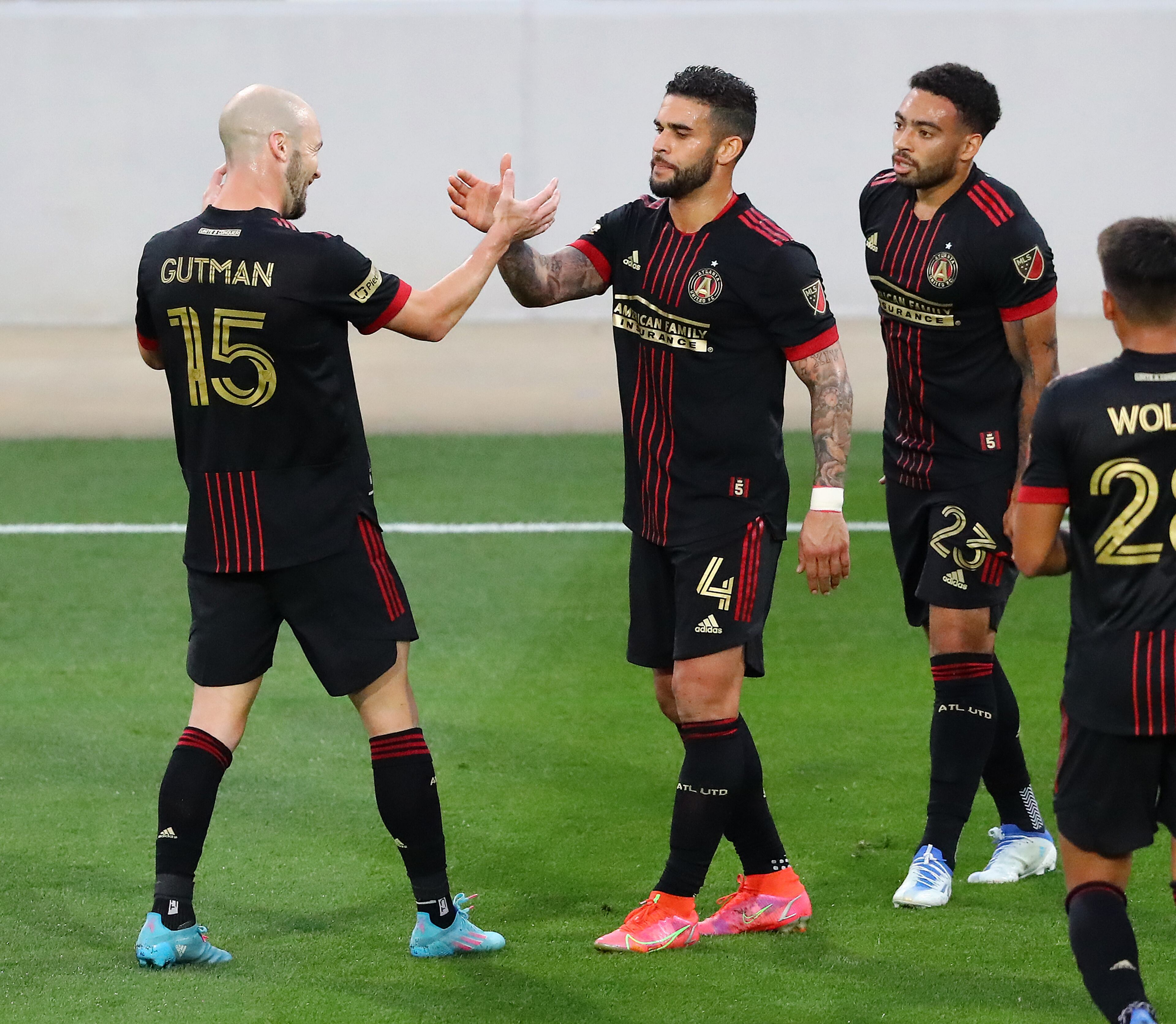 Atlanta United attacker Dom Dwyer (center) gets five from Andrew Gutam after scoring a goal against Chattanooga FC for a 2-0 lead in the Lamar Hunt U.S. Open Cup on Wednesday, April 20, 2022, in Kennesaw. It was Dwyer's first of two goals. At right is midfielder Jake Mulraney. “Curtis Compton / Curtis.Compton@ajc.com”