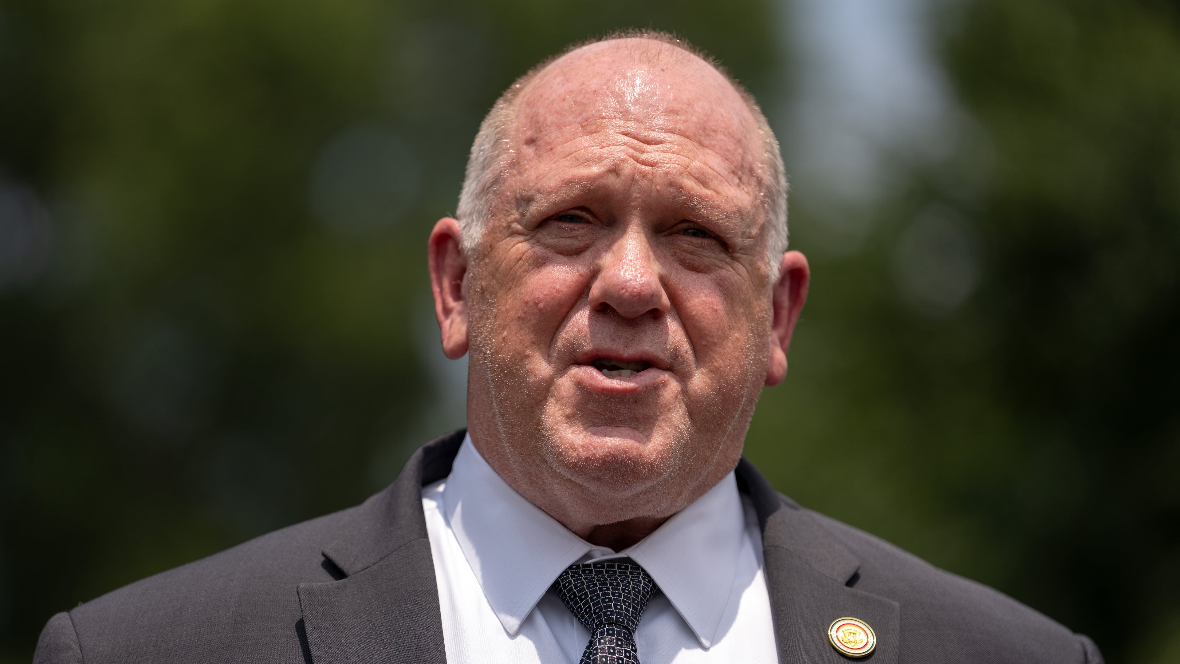 White House border czar Tom Homan speaks with reporters outside the White House, Monday, July 20, 2026, in Washington. (AP Photo/Mark Schiefelbein)
