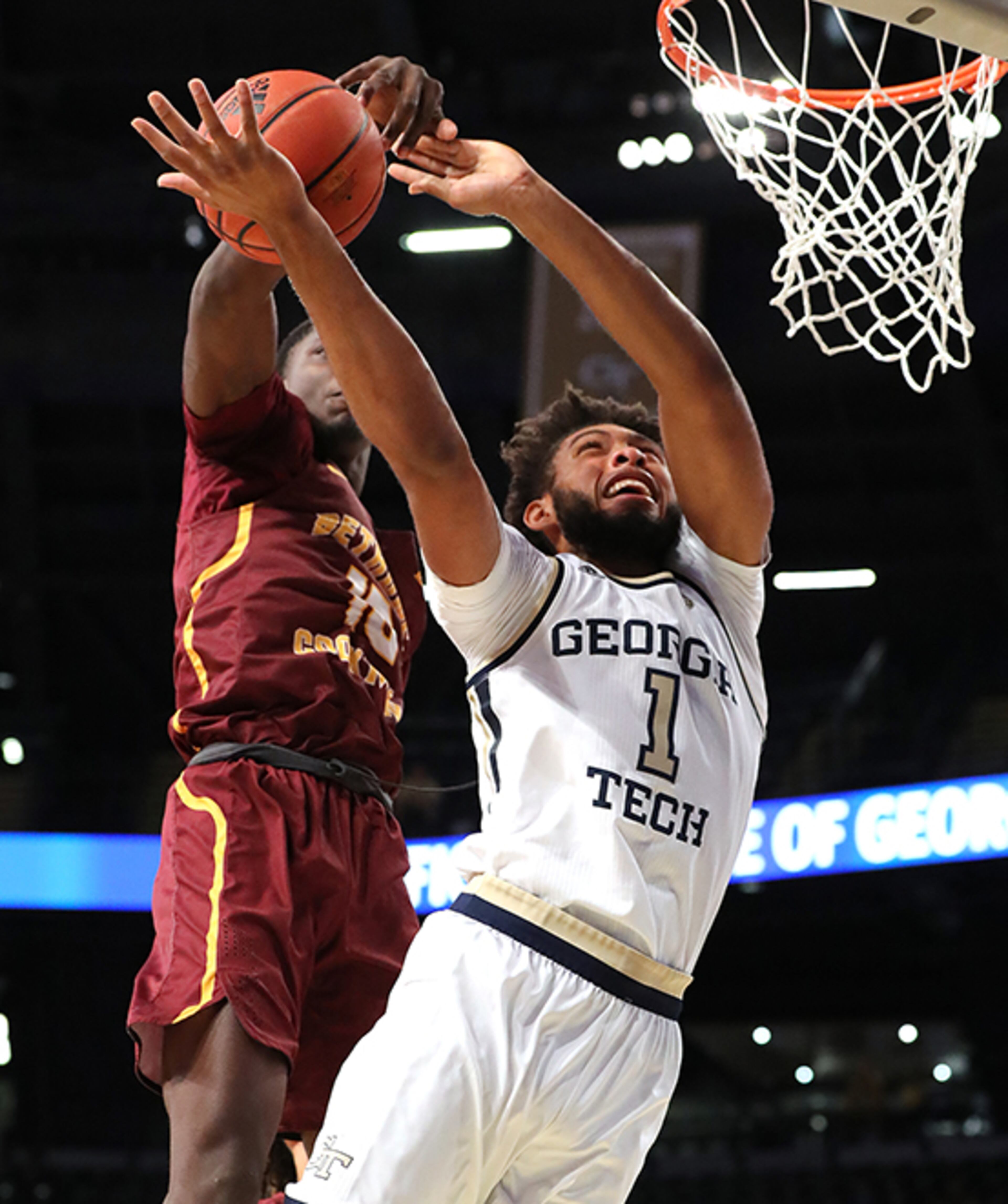 Tech forward James Banks goes to the basket as Bethune-Cookman forward Cletrell Pope blocks the shot Sunday, Dec. 1, 2019, at McCamish Pavilion in Atlanta.