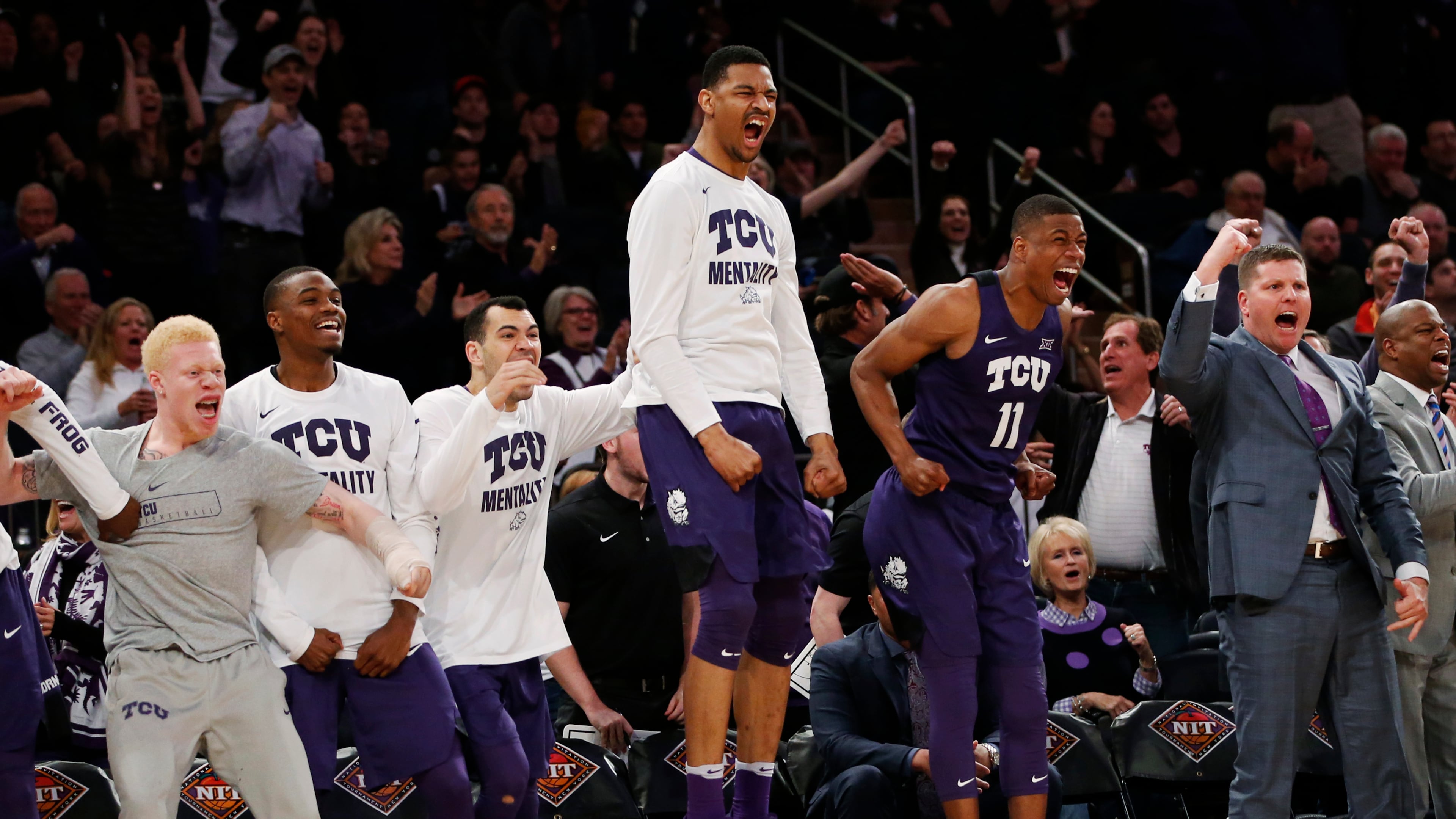 The TCU bench reacts against Central Florida during the second half of an NCAA college basketball game in the semifinals of the NIT Tuesday, March 28, 2017, in New York. (AP Photo/Kathy Willens)