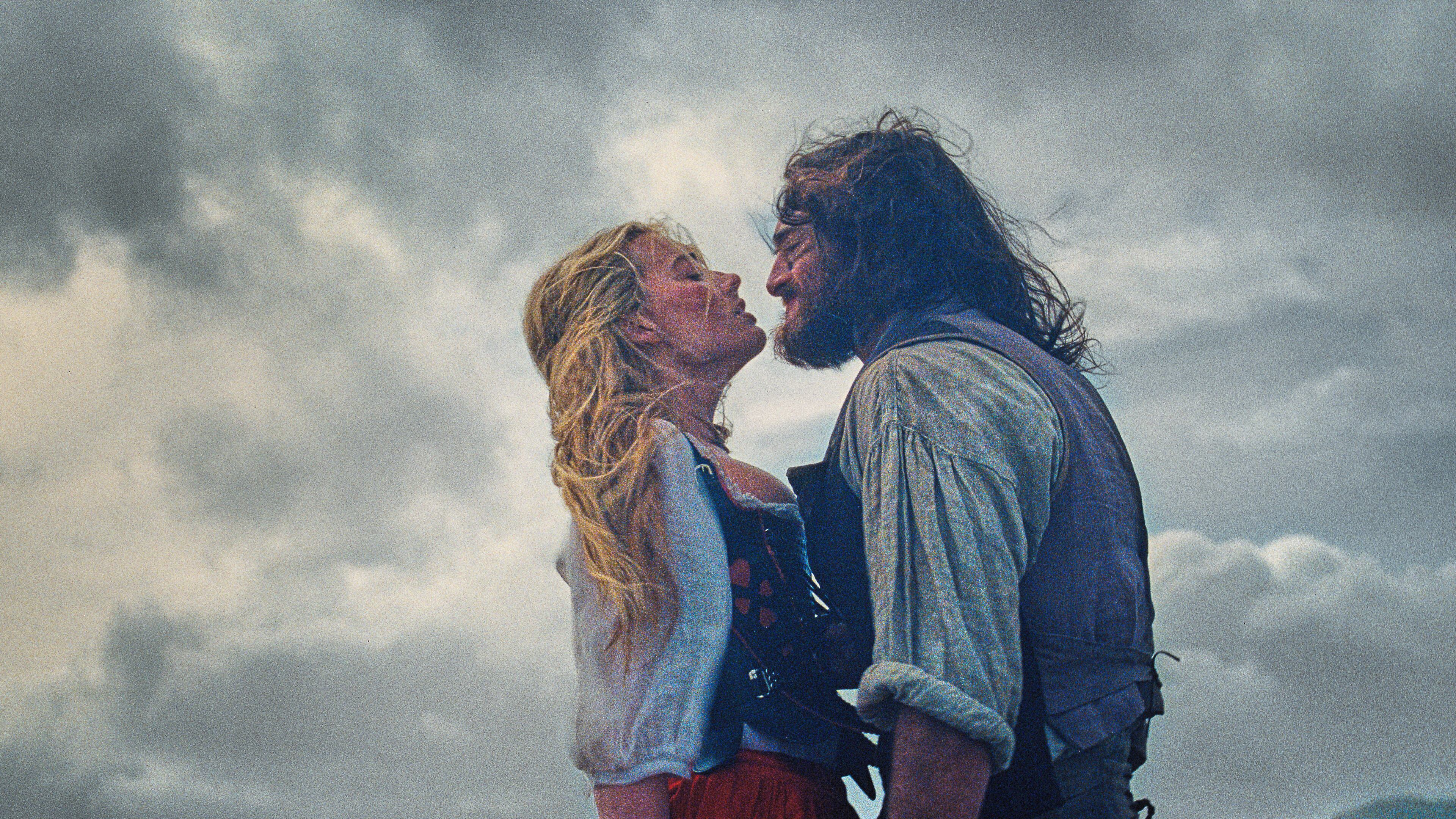 This image released by Warner Bros. Pictures shows Margot Robbie, left, and Jacob Elordi in a scene from "Wuthering Heights." (Warner Bros. Pictures via AP)