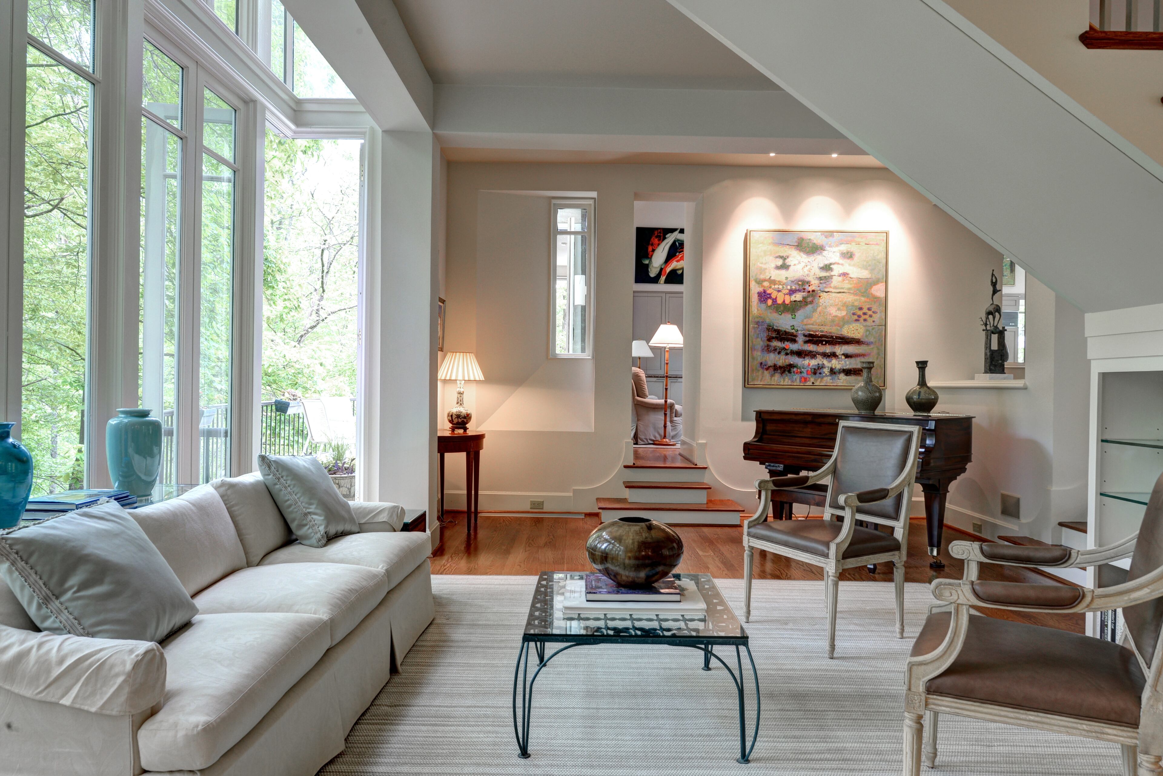 One of the few Bobby McAlpine designed homes in Atlanta, this deconstructed Dutch Colonial is the exact fit for the discerning buyer who seeks the extraordinary. Highest quality construction with cool spaces and complete privacy. 2.7 acres on a private street. Perfect as it is, or there are additional unfinished spaces within the house that would allow for 2 additional bedrooms and a 4th living area. Main level master, den and living room all open to large entertaining deck. Wonderful gourmet kitchen and updated baths, but the real star here is the architecture. For more information, please visit http://travisandmichael.idxco.com/idx/19269/details.php?idxID=092&listingID=5283979