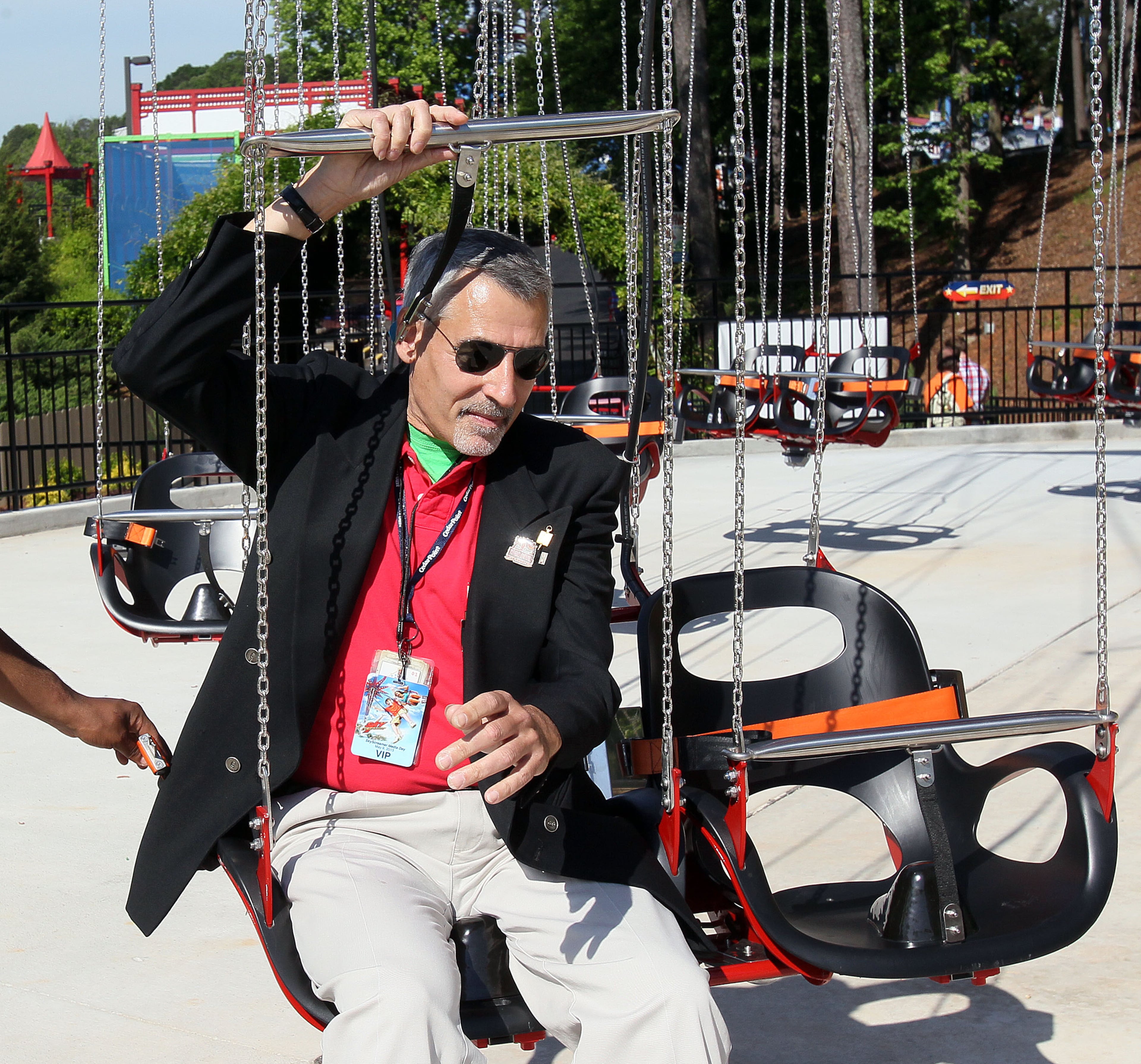 AJC's Tom Kelley prepares to ride the new 24 story tall SkyScreamer extreme swing ride at Six Flags Over Georgia in Austell during a preview event on Thursday May 9th, 2013. PHIL SKINNER / PSKINNER@AJC.COM
