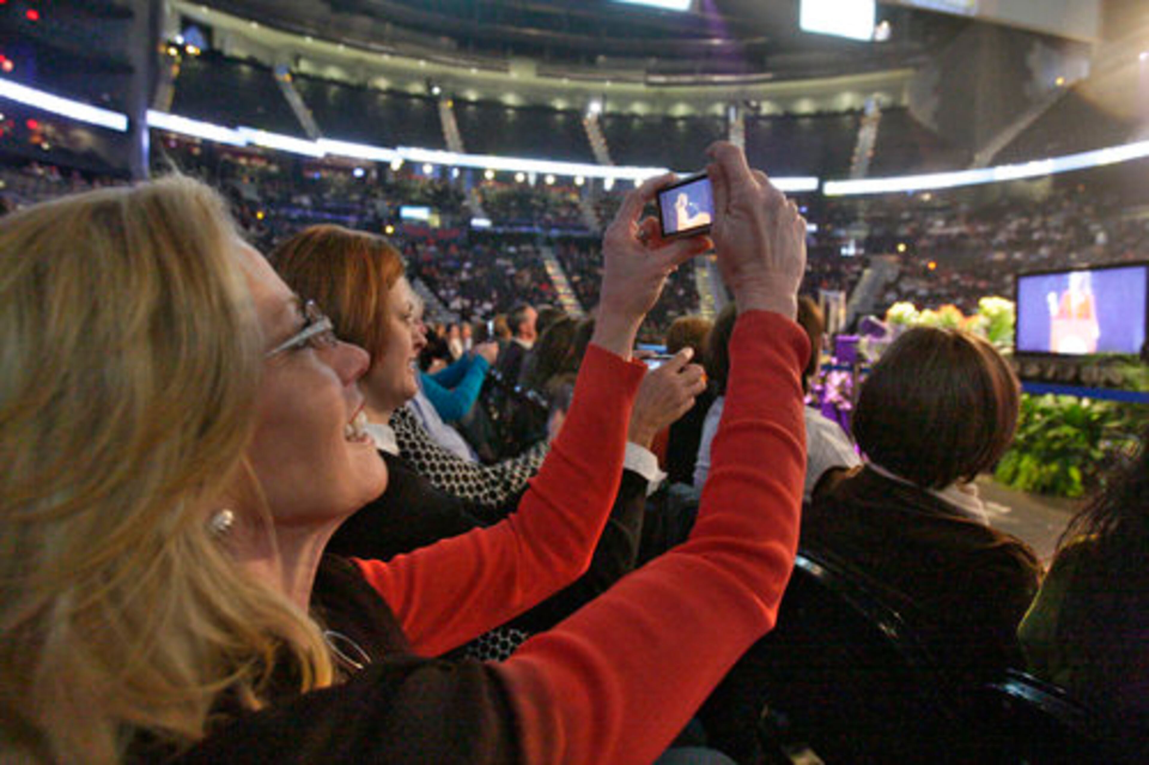 Atlanta - Julianne Purcell (front) and Donna Sant were excited to see Sarah Palin and gave her a standing ovation.