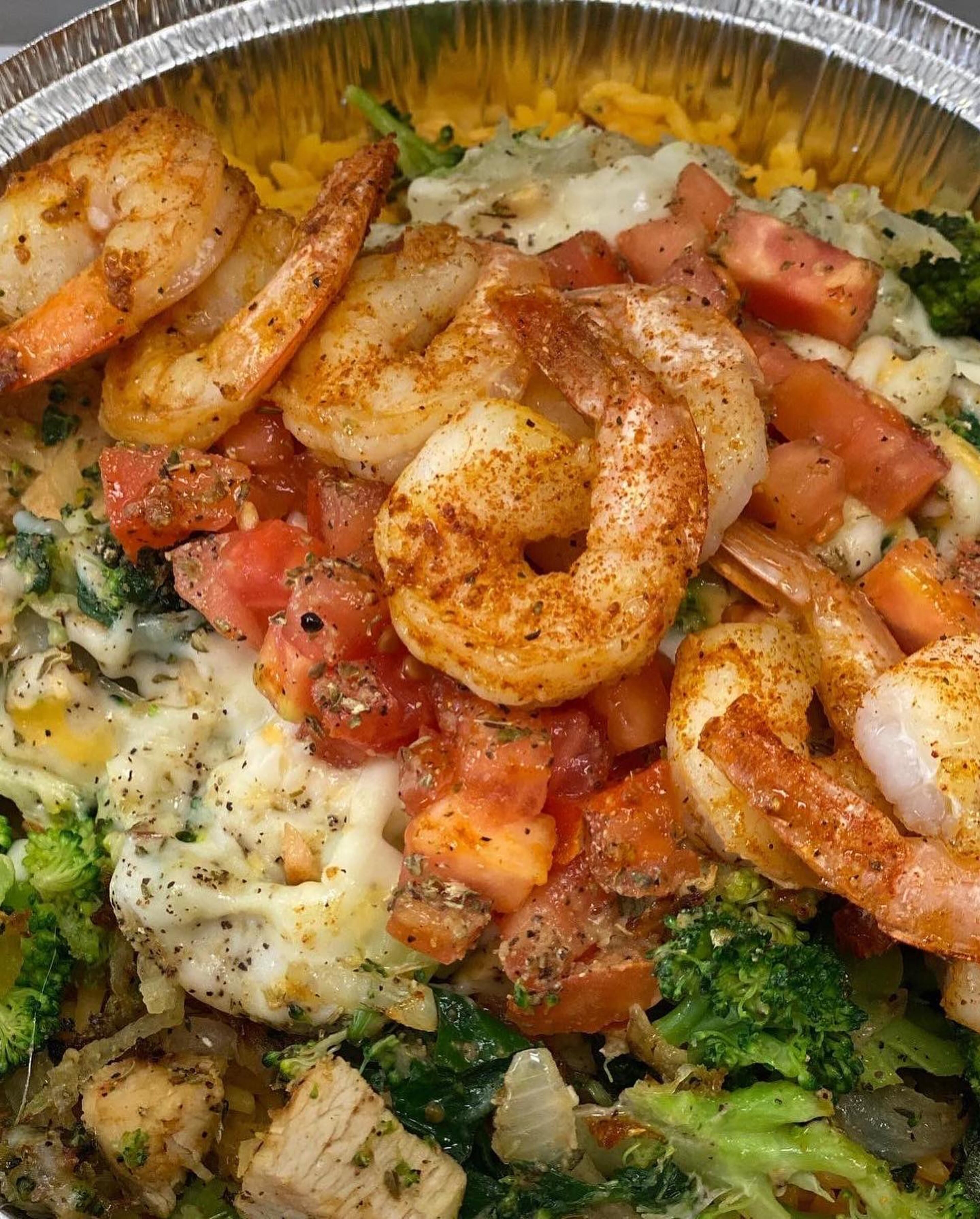 Shrimp over rice at Mr. Everything Cafe.