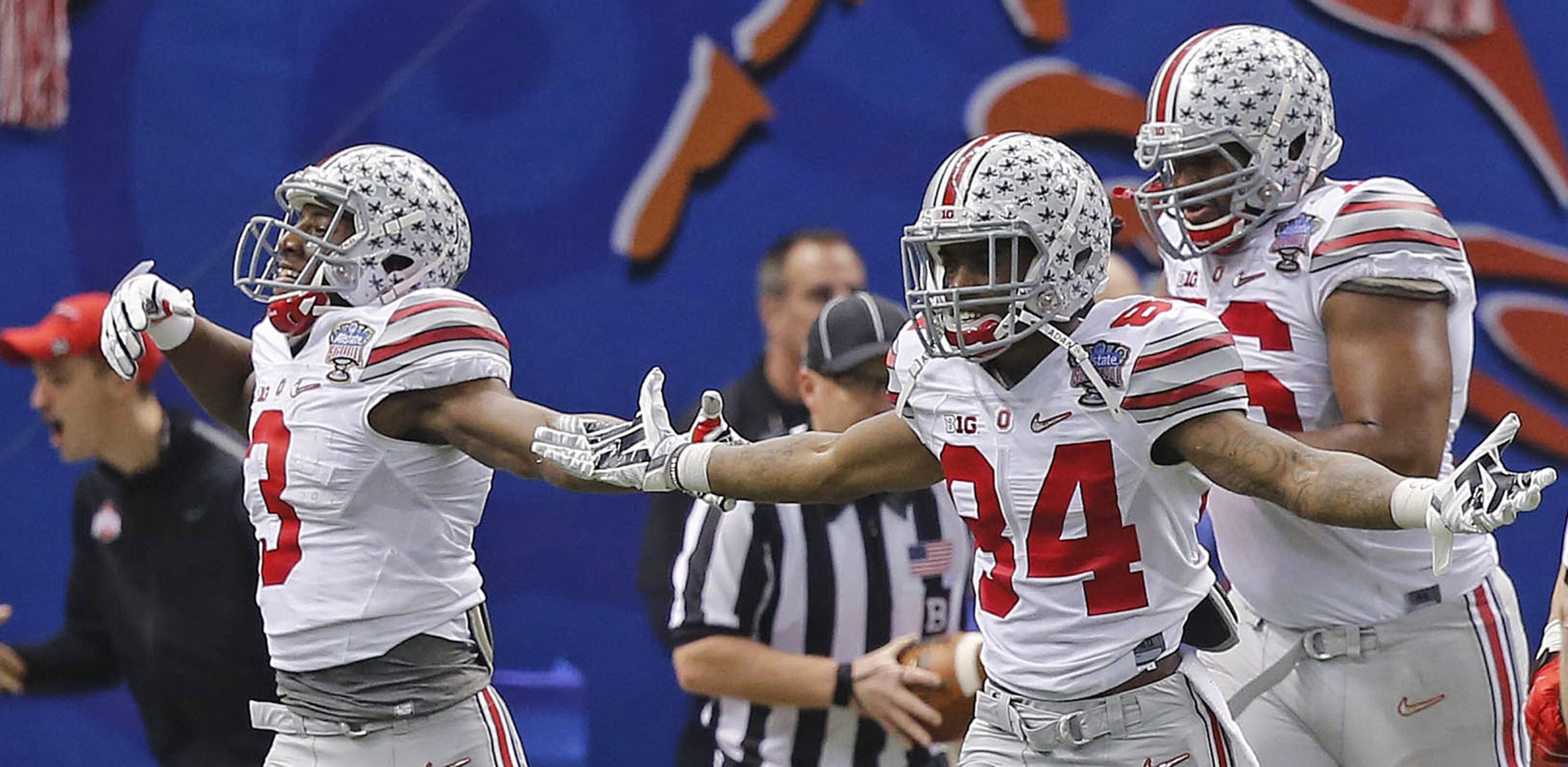 Ohio State players celebrates touchdown by running back Ezekiel Elliott in the second half of the Sugar Bowl NCAA college football playoff semifinal game against Alabama, Thursday, Jan. 1, 2015, in New Orleans. (AP Photo/Bill Haber)