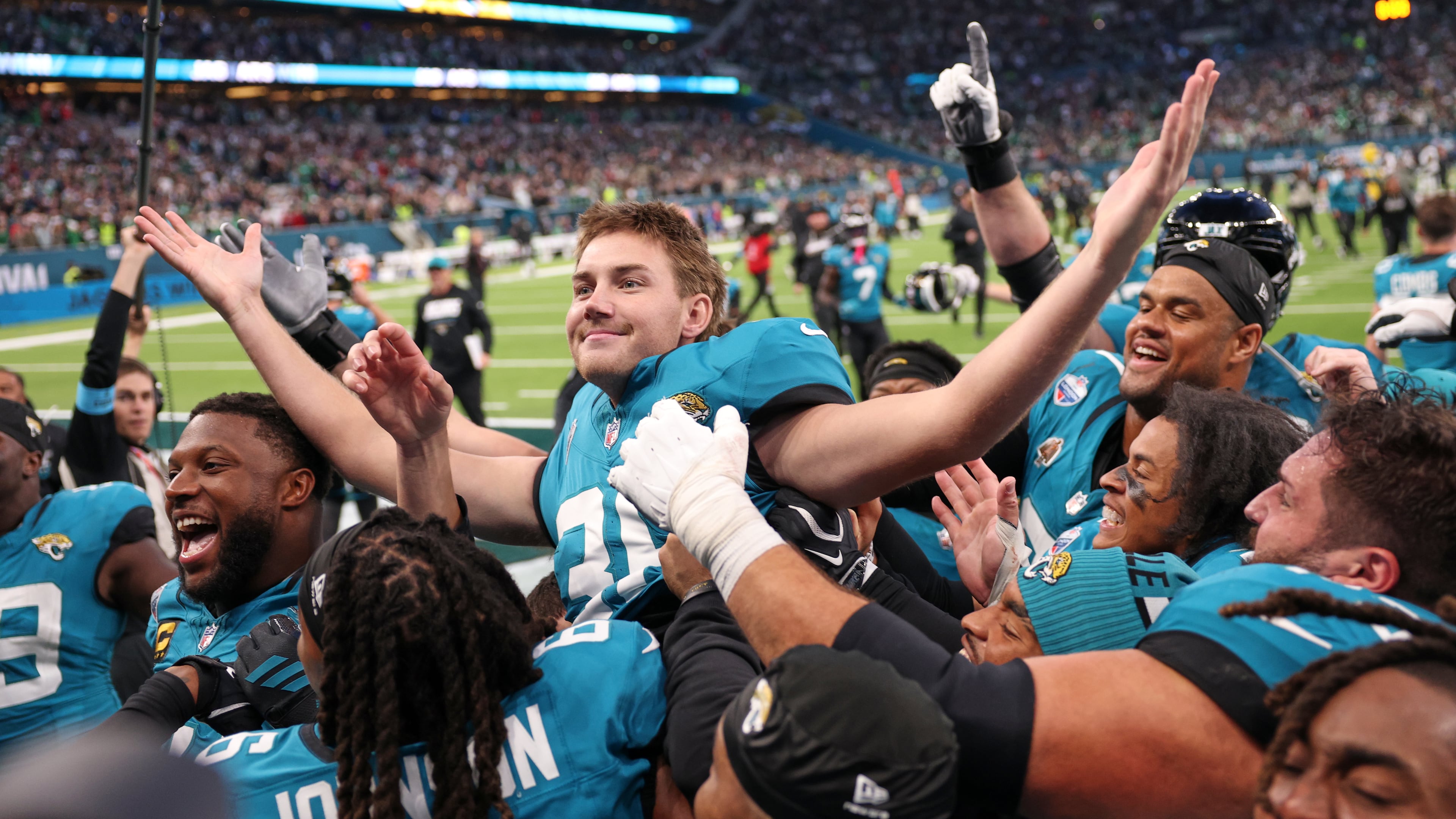Jacksonville Jaguars place kicker Cam Little (39) celebrates after scoring the winning field goal during an NFL football game against Philadelphia Eagles in London, Sunday, Oct. 11, 2026. (AP Photo/Ian Walton)