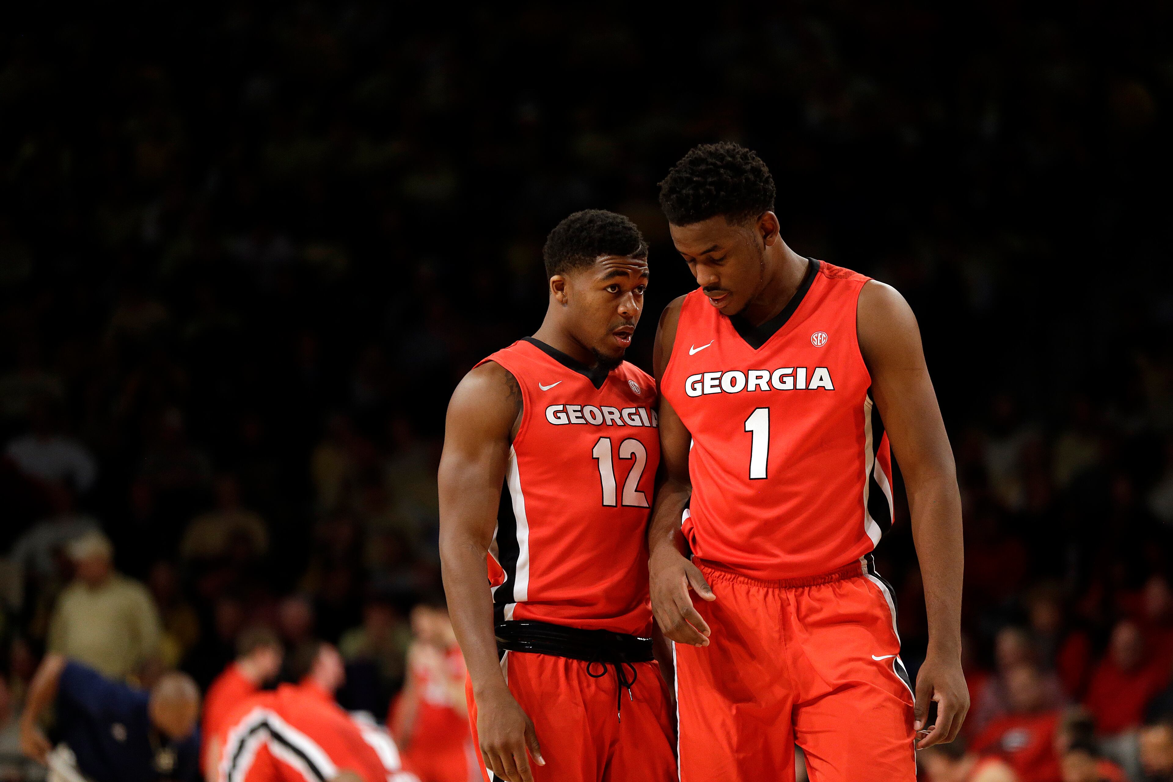 Georgia's Kenny Gaines, left, talk with teammate Yante Maten in the second half of an NCAA college basketball game against Georgia Tech, Friday, Nov. 14, 2014, in Atlanta. (AP Photo/David Goldman)