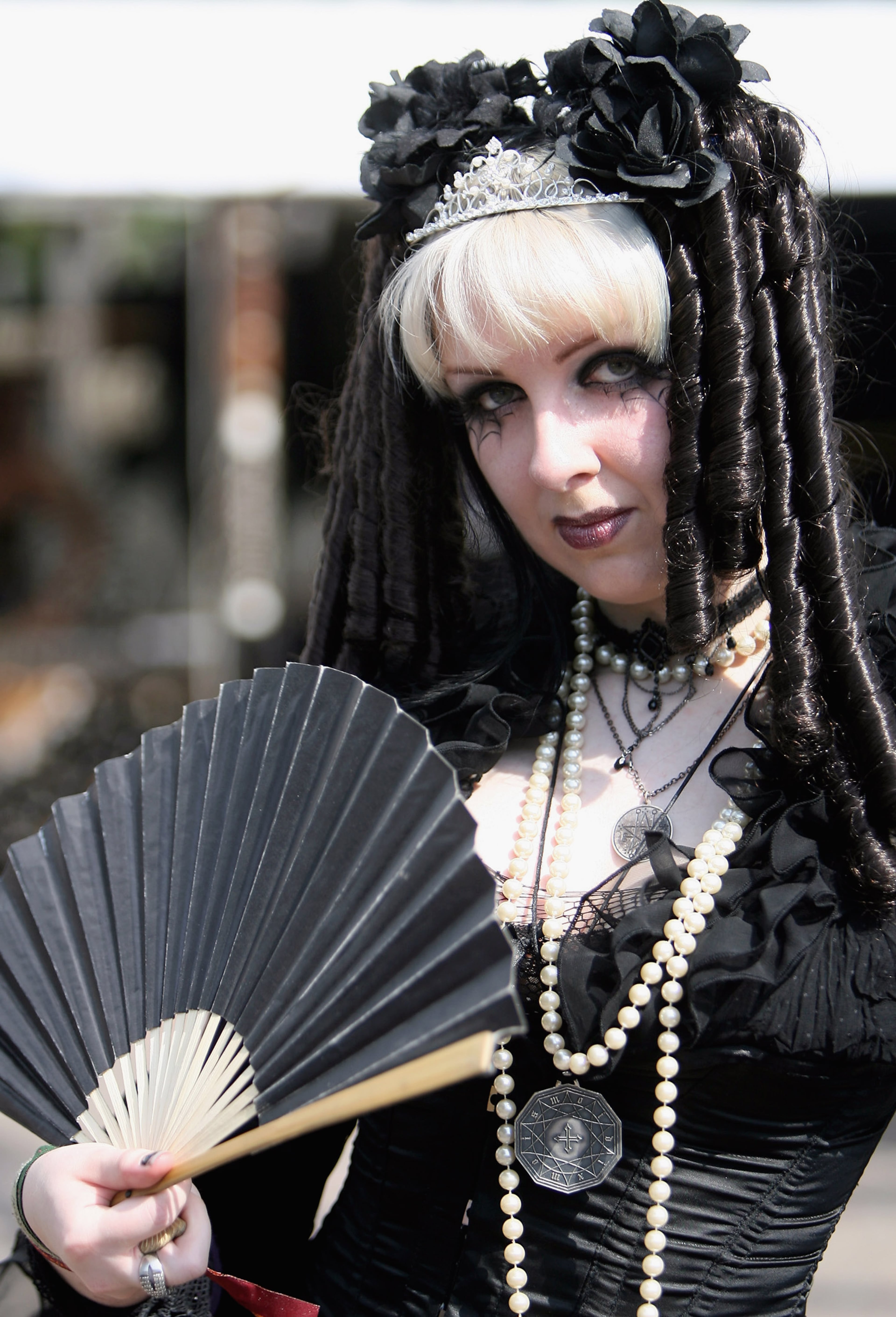 LEIPZIG, GERMANY - MAY 25: Participants of the annual Wave Gothic Festival roam the camp site of the four day music festival showing off their costumes and make up on Friday, 25 May 2007 in Leipzig, Germany. The festival, which started out in 1992 with a small line up of only 10 bands, has grown to span four days and dozens of bands playing outside and inside venues across Leipzig. (Photo by Katja Buchholz/Getty Images)