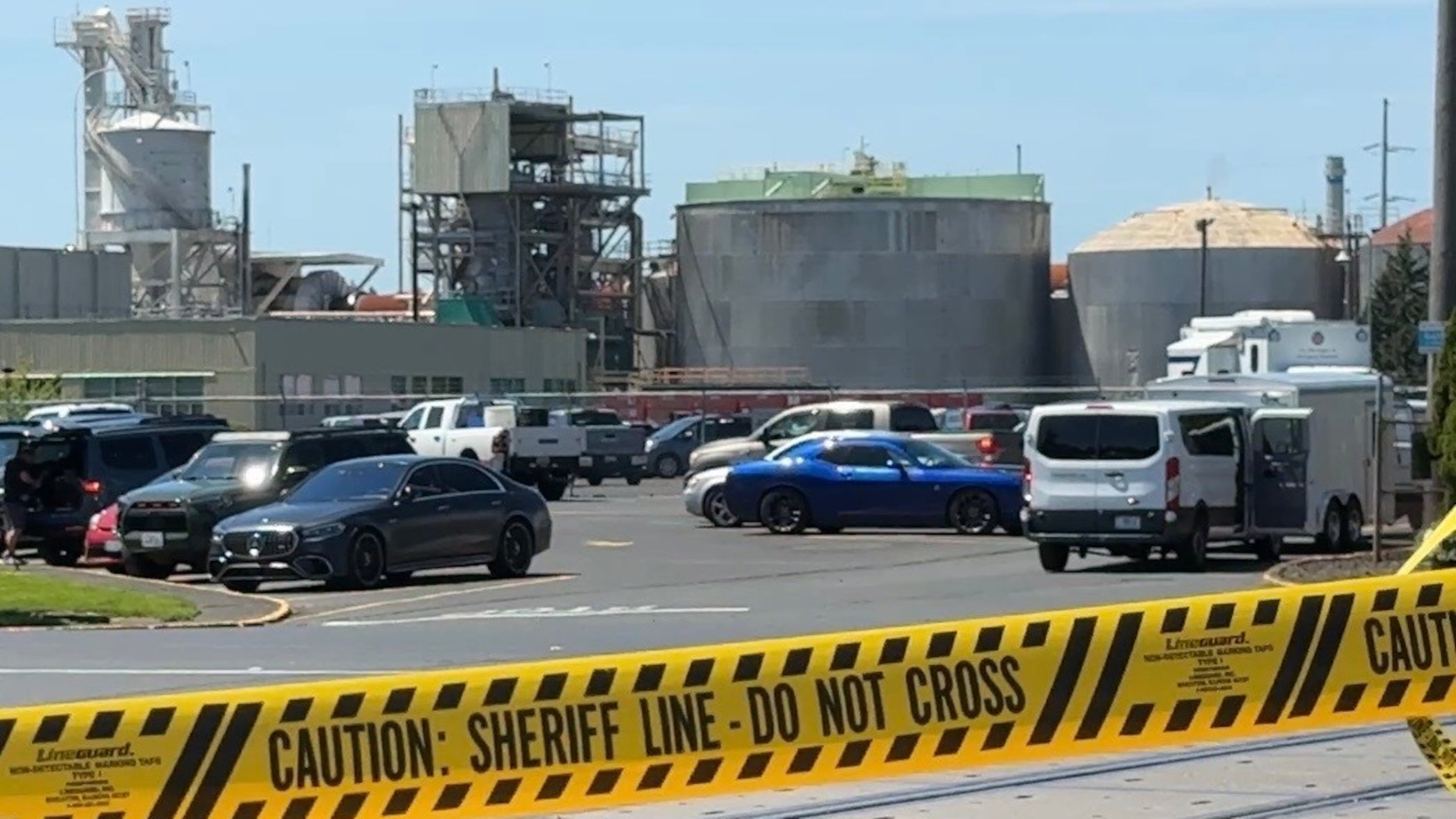 FILE - Yellow police tape is seen on May 27, 2026 outside the Longview, Wash. paper mill where a deadly chemical tank failure occurred. (AP Photo/Claire Rush, File)