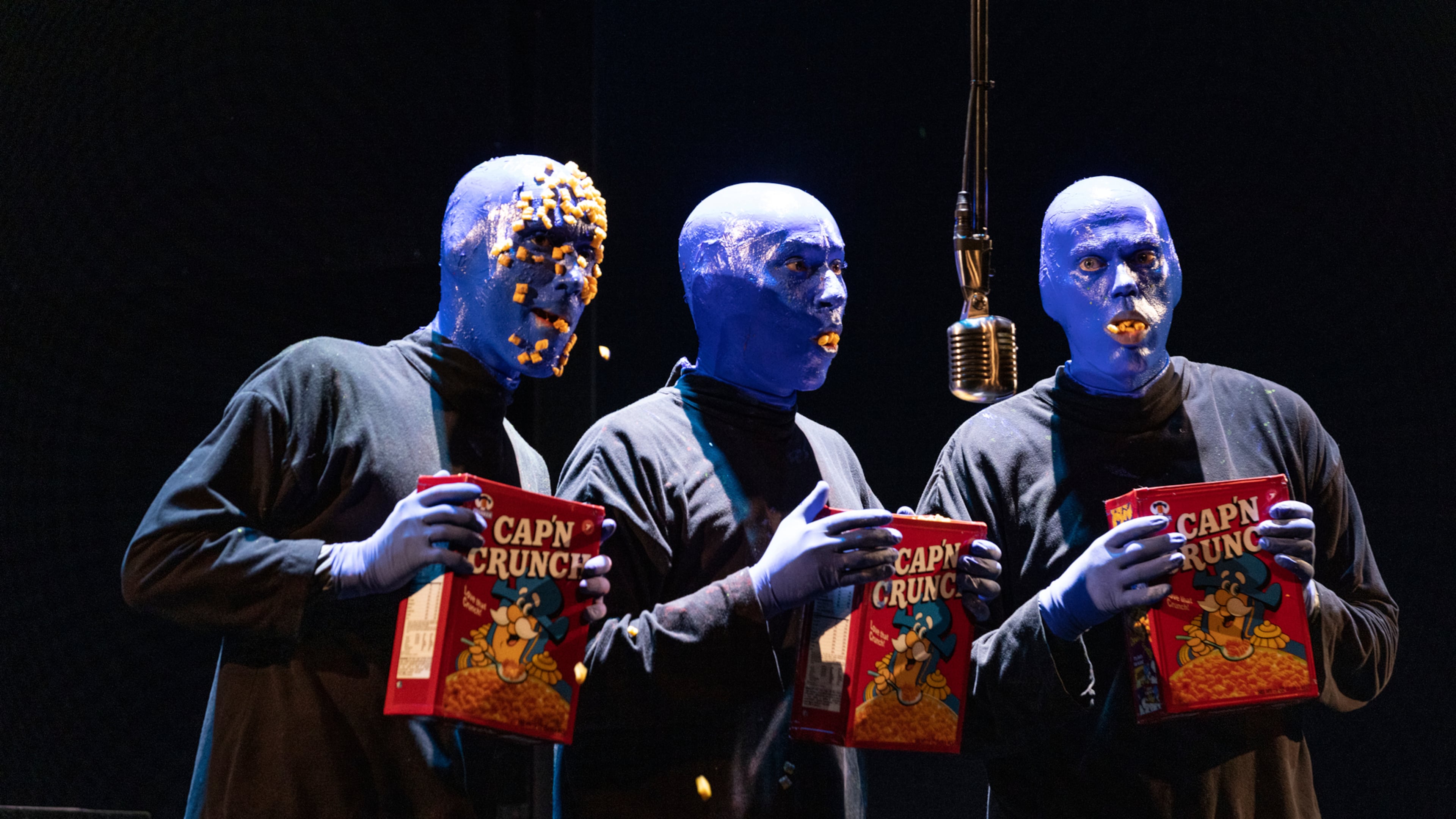 Blue Man Group members perform in Chicago in this 2021 photo courtesy of the Blue Man Group (Credit: Kyle Flubacker)