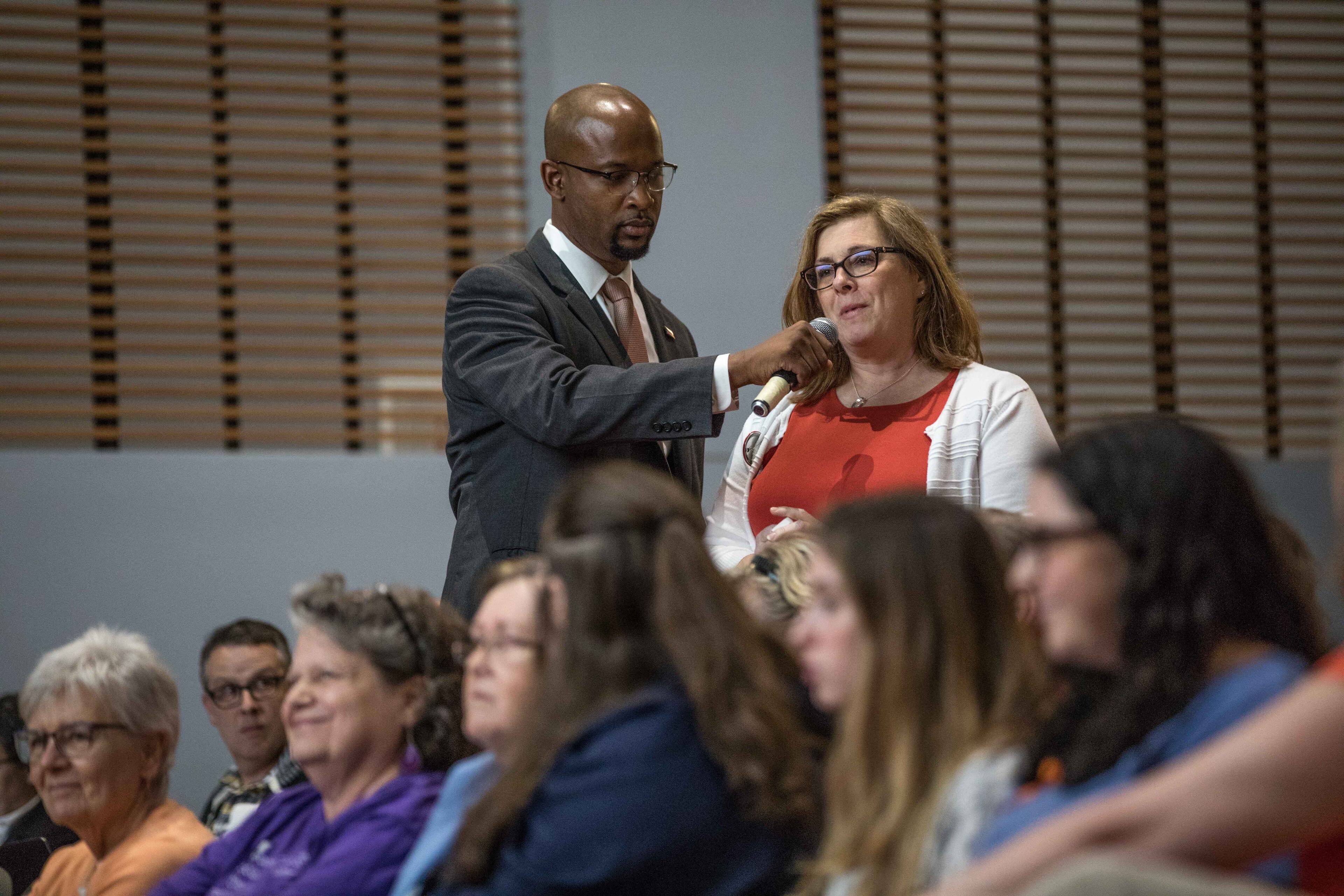Lori Goldstrom asks U.S. Rep. Lucy McBath, D-Marietta., a question during a town hall at Dunwoody High School on Saturday, June 8, 2019. (Photo: Branden Camp/Special to the AJC)