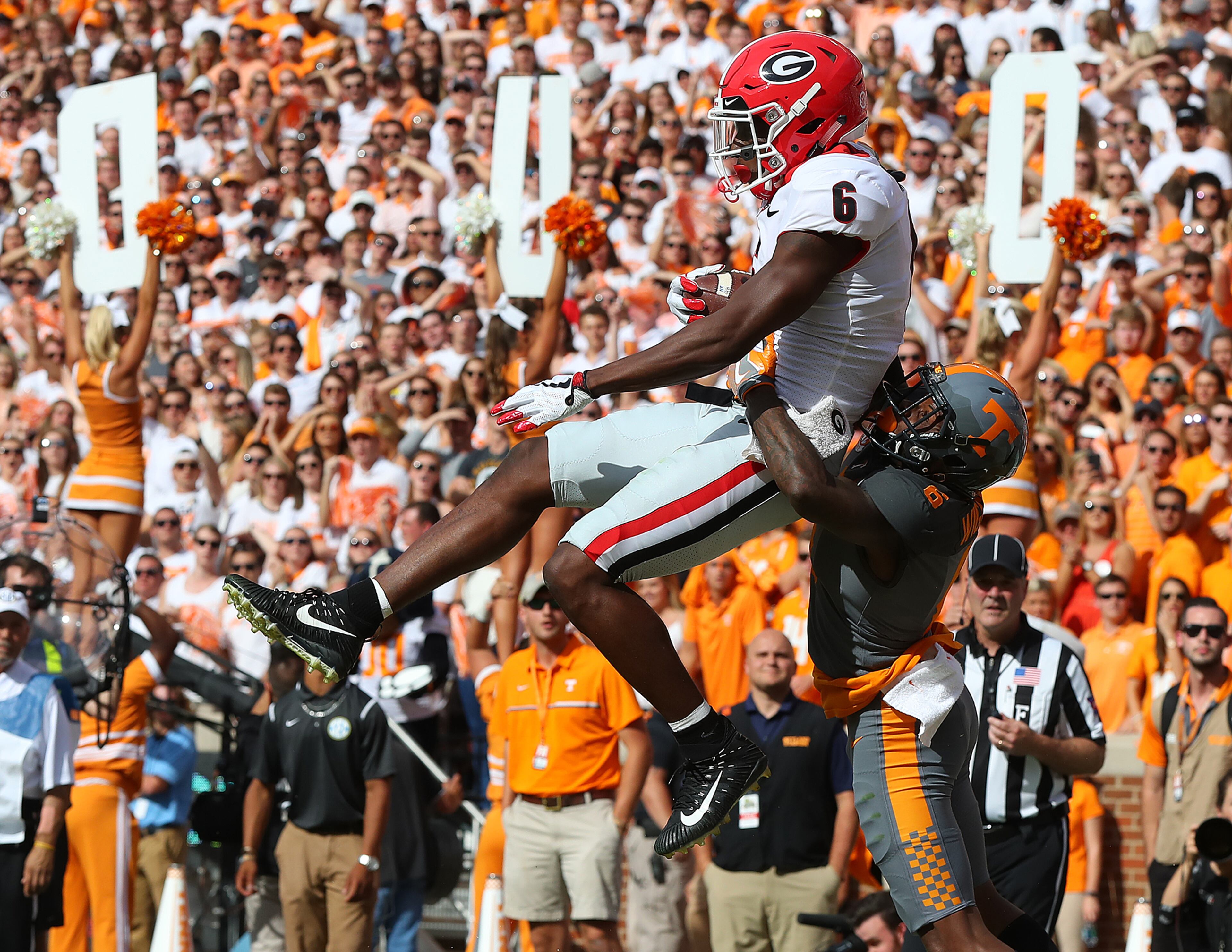September 30, 2017 Knoxville: Georgia wide receiver Javon Wims catches a touchdown pass over Tennessee defensive back Shaq Wiggins for a 7-0 lead during the first quarter in a NCAA college football game on Saturday, September 30, 2017, in Knoxville. Curtis Compton/ccompton@ajc.com