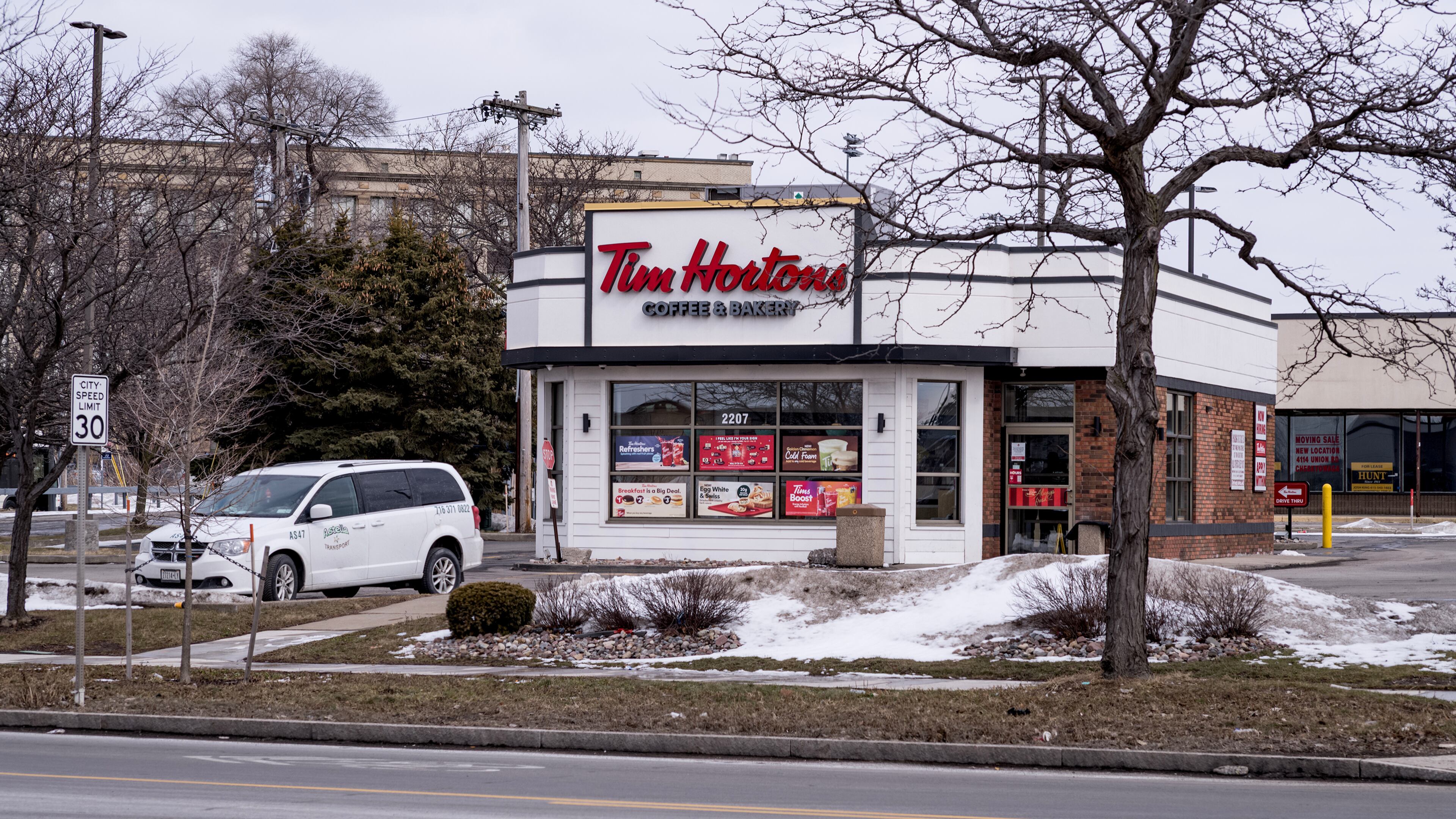 A vehicle rests in the parking lot of a Tim Horton's Coffee and Bakery shop, Friday, Feb. 27, 2026, in Buffalo, N.Y., the site where Nurul Amin Shah Alam, was dropped off after being released by Border Patrol agents last week. (AP Photo/Craig Ruttle)