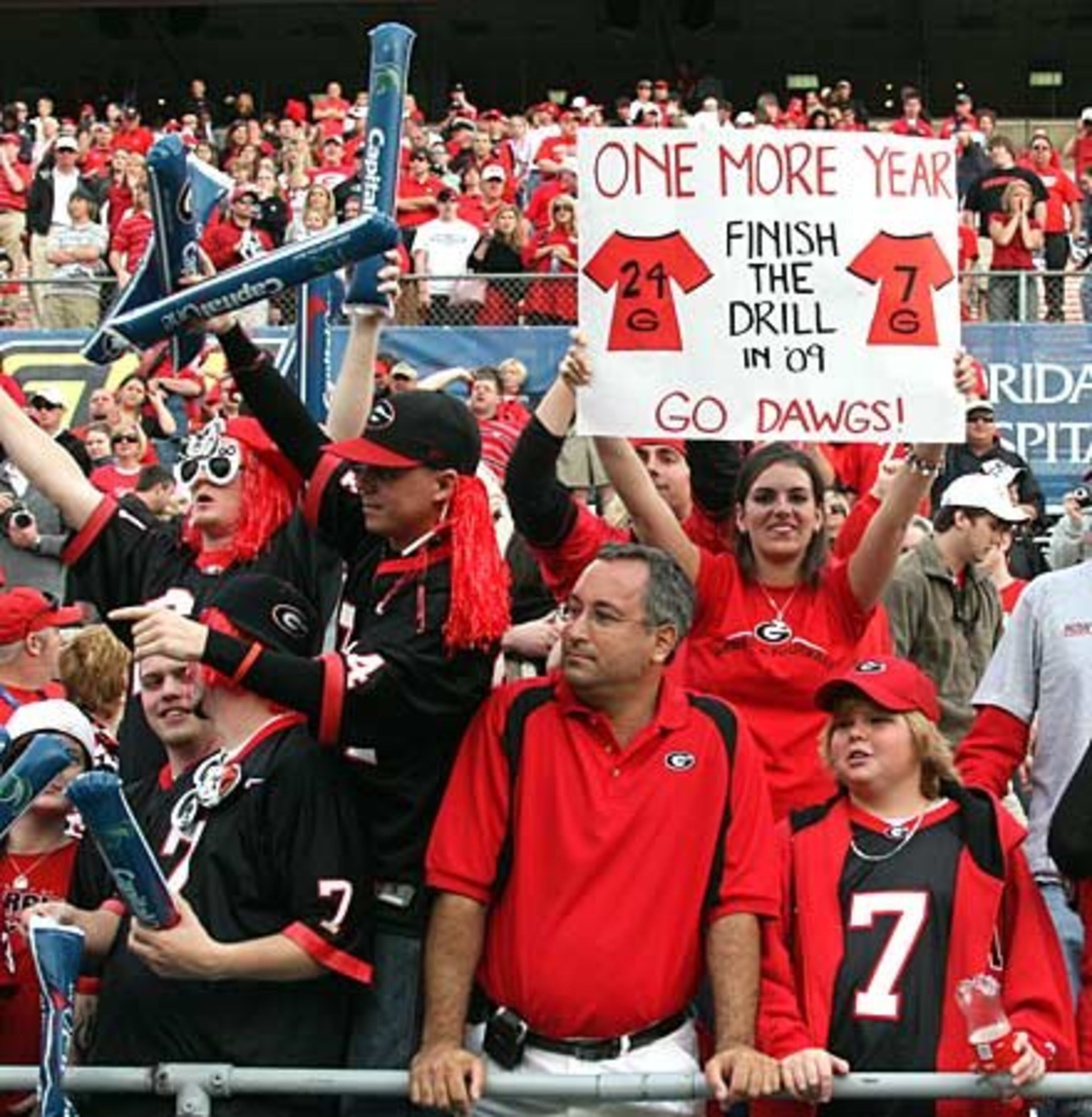 Georgia fans chanted for quarterback Matthew Stafford and running back Knowshon Moreno to stay "One more Year" following the Bulldogs' victory over Michigan State in the Capital One Bowl .