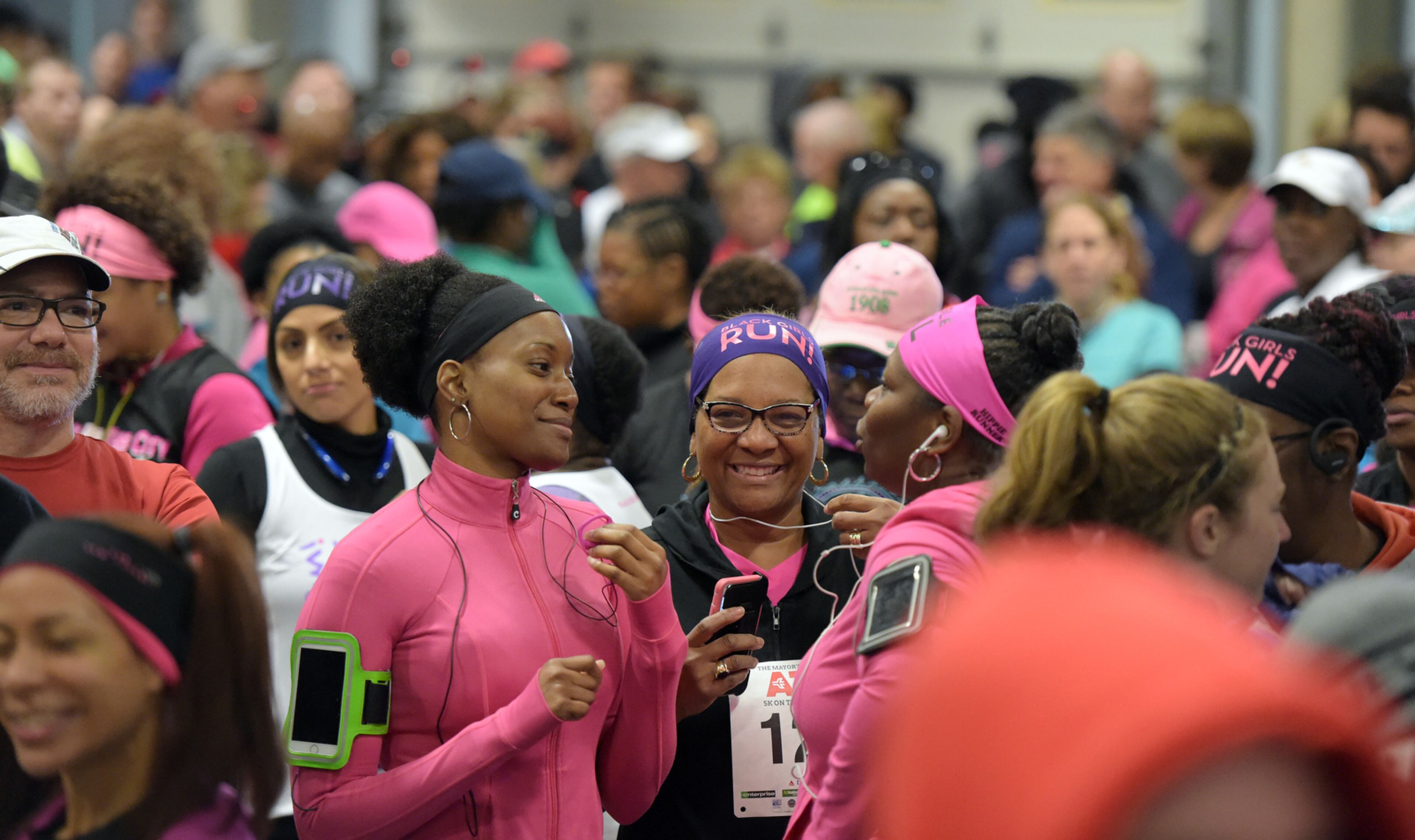 OCTOBER 17, 2015 ATLANTA Runners gather inside Atlanta Fire Station #33 prior to the race. Mayor Kasim Reed and United Way President Milton Little joined more than 2,000 runners at the Mayor’s Inaugural 5K on the 5th Runway at the world’s busiest airport Saturday, October 17, 2015. Airport officials shut down the 5th runway (Runway 10/28) until 8:15 am so runners and walkers could exit the course. All proceeds from the event will benefit United Way of Greater Atlanta. Major sponsors of The Mayor’s Inaugural 5K on the 5th Runway include Delta Air Lines, The Coca-Cola Company, Enterprise Rental Car, Georgia International Convention Center, MARTA, and Publix. Over $123,000 was raised, said airport spokesman Reese McCranie. The race's overall winner was Andrew Murfee, 15, a Woodward Academy student. KENT D. JOHNSON/KDJOHNSON@AJC.COM