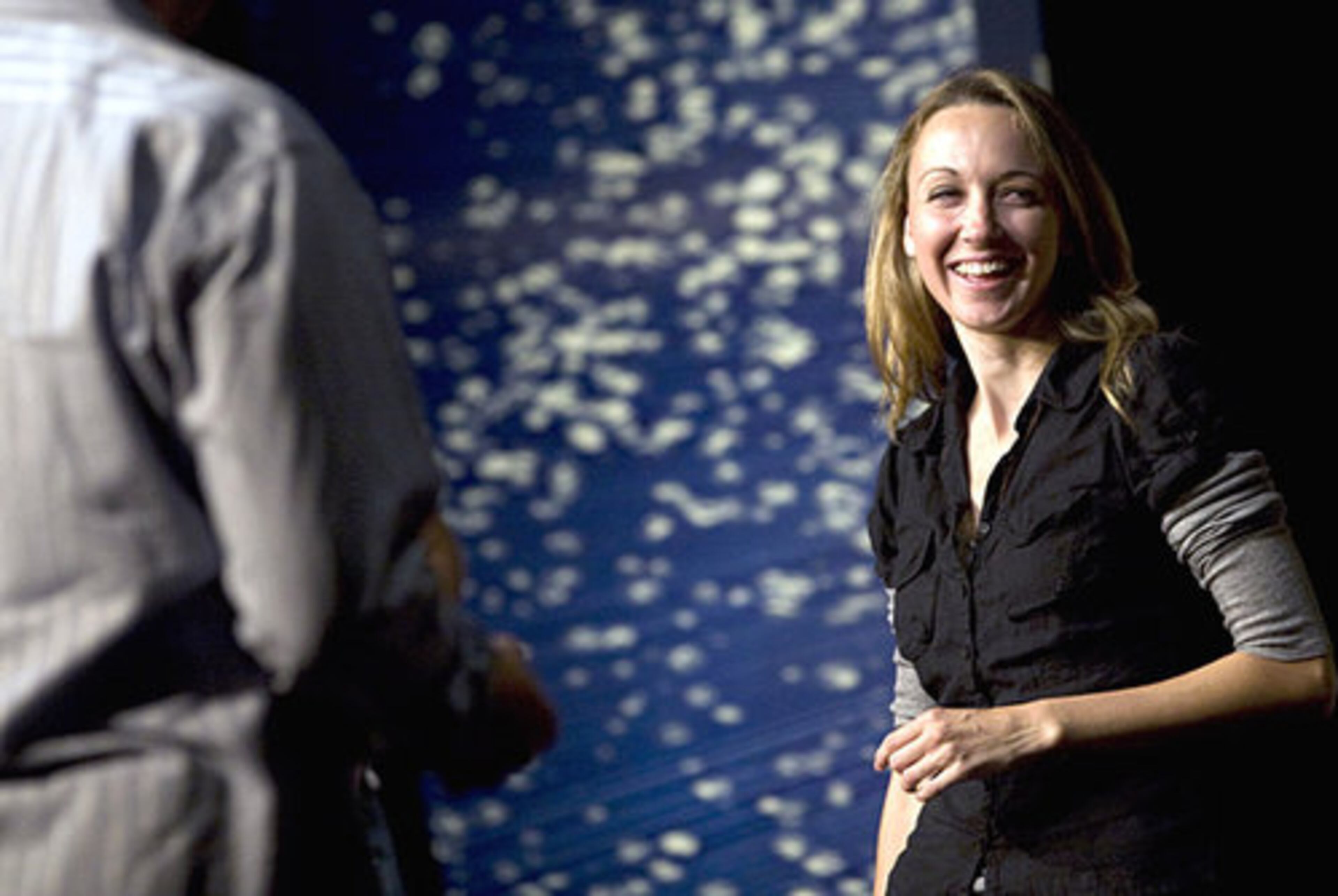 Second City player, Robyn Norris, right, bursts out in laughter during rehearsal. The troupe chose the self-mocking name "The Second City" from the title of an article about Chicago by A. J. Liebling that appeared in The New Yorker in 1952.