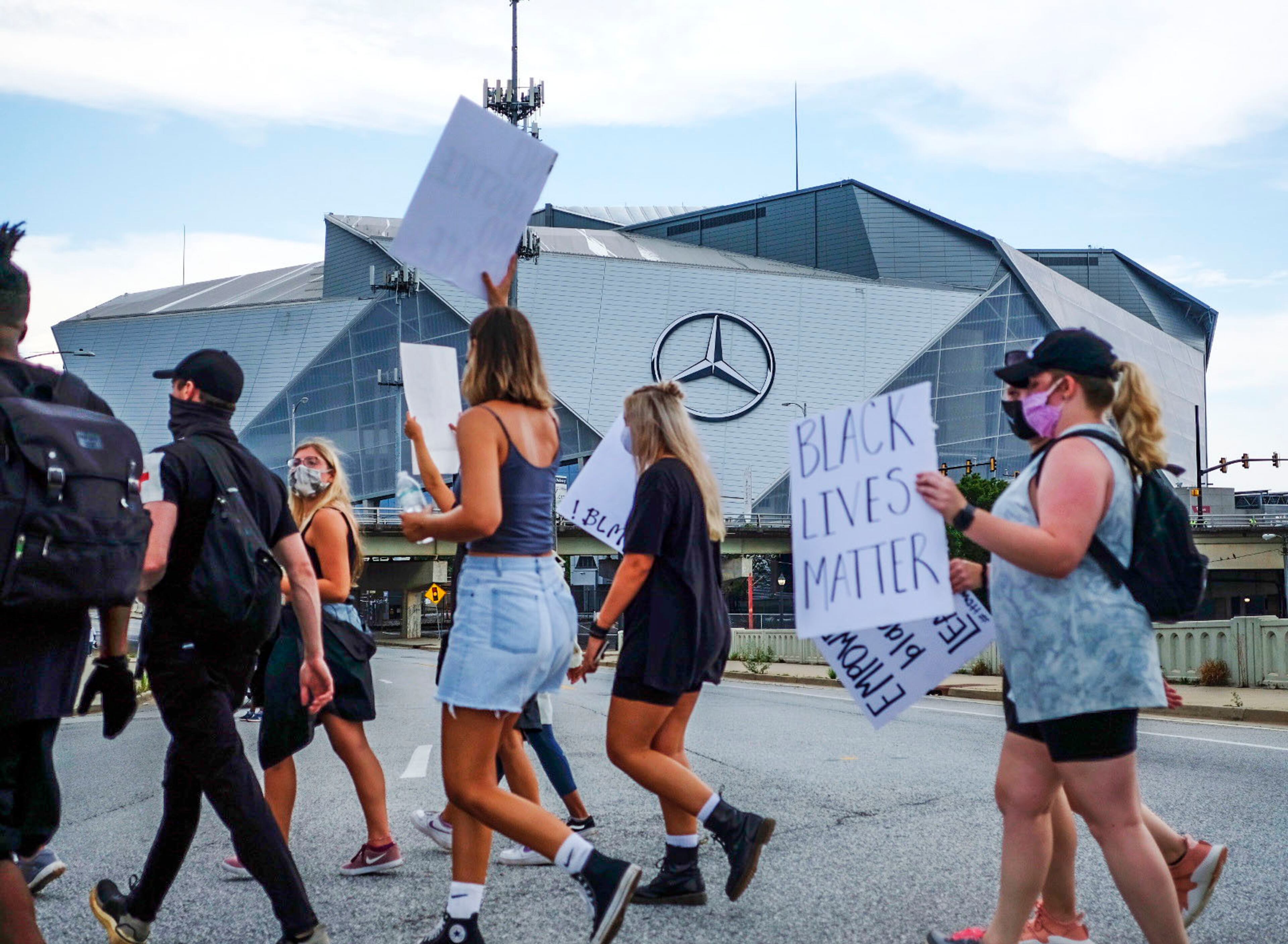Groups of demonstrators gathered late Friday afternoon as protests continued in downtown Atlanta.
