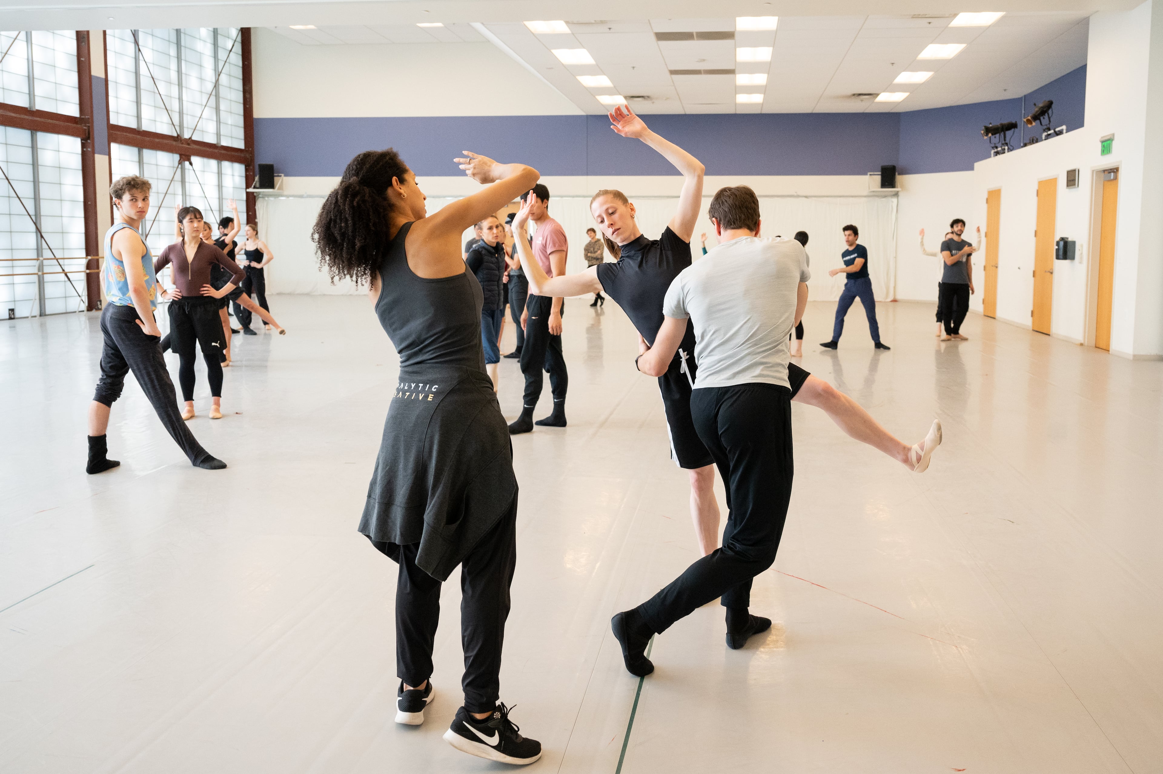 Guest choreographers and Atlanta Ballet resident choreographer Claudia Schreier, shown working with Darian Kane and Marius Morawski on the 2024 world premiere adaptation of “The Rite of Spring,” have been impressed with Gennadi Nedvigin’s dancers. (Courtesy of Shoccara Marcus)