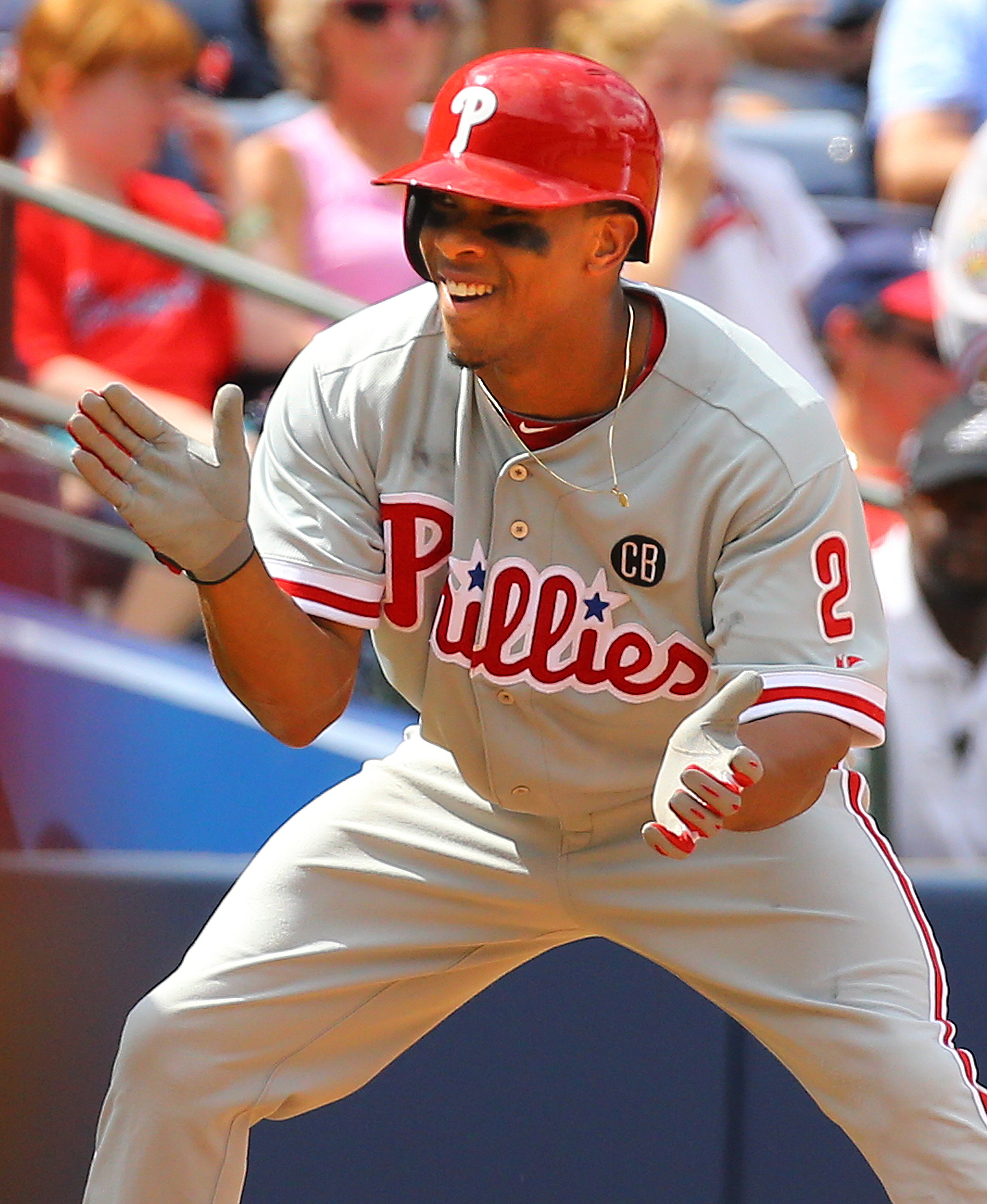 Phillies Ben Revere celebrates reaching third base for a 3-RBI triple against the Braves during the seventh inning in a baseball game in Atlanta on Monday, Sept. 1, 2014. CURTIS COMPTON / CCOMPTON@AJC.COM