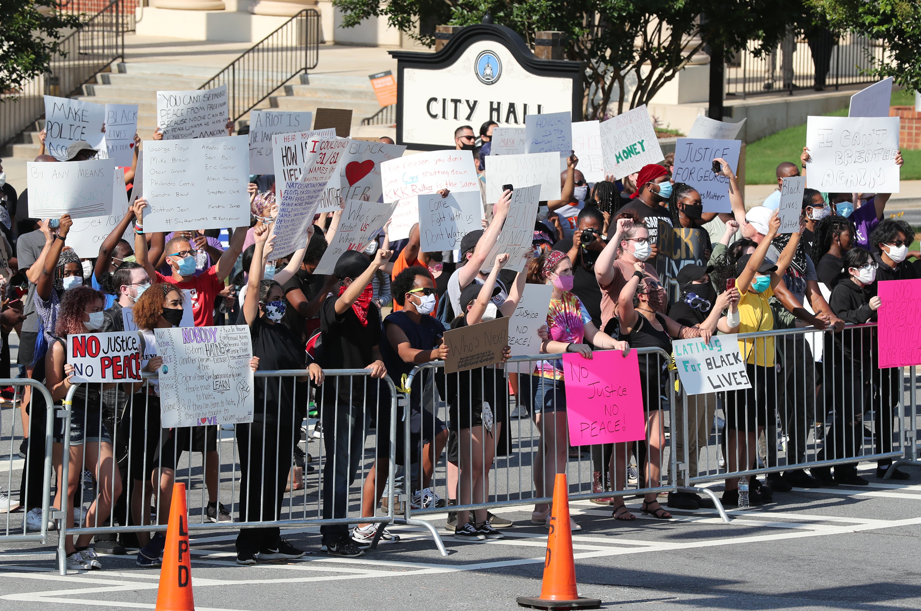 060120 Lawrenceville: Hundreds of protesters gather outside Lawrenceville City Hall as protests continue for a fourth day around metro Atlanta over the death of George Floyd on Monday, June 1, 2020, in Lawrenceville. Curtis Compton ccompton@ajc.com