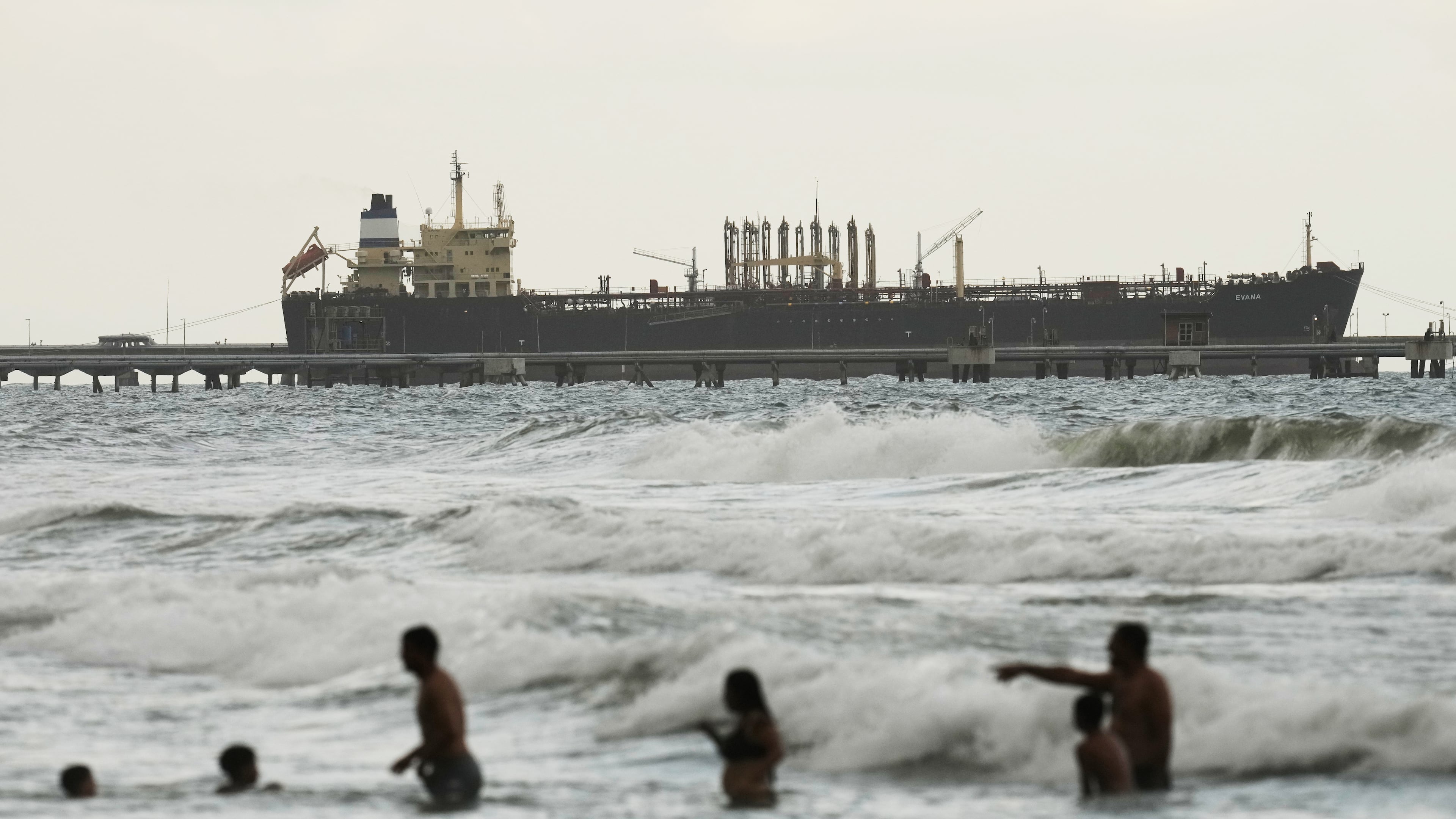 FILE - Evana, an oil tanker, is docked at El Palito Port in Puerto Cabello, Venezuela, Dec. 21, 2025. The U.S. military says U.S. forces have boarded another oil tanker in the Caribbean Sea. The Olina is the fifth tanker seized by U.S. forces. (AP Photo/Matias Delacroix, File)