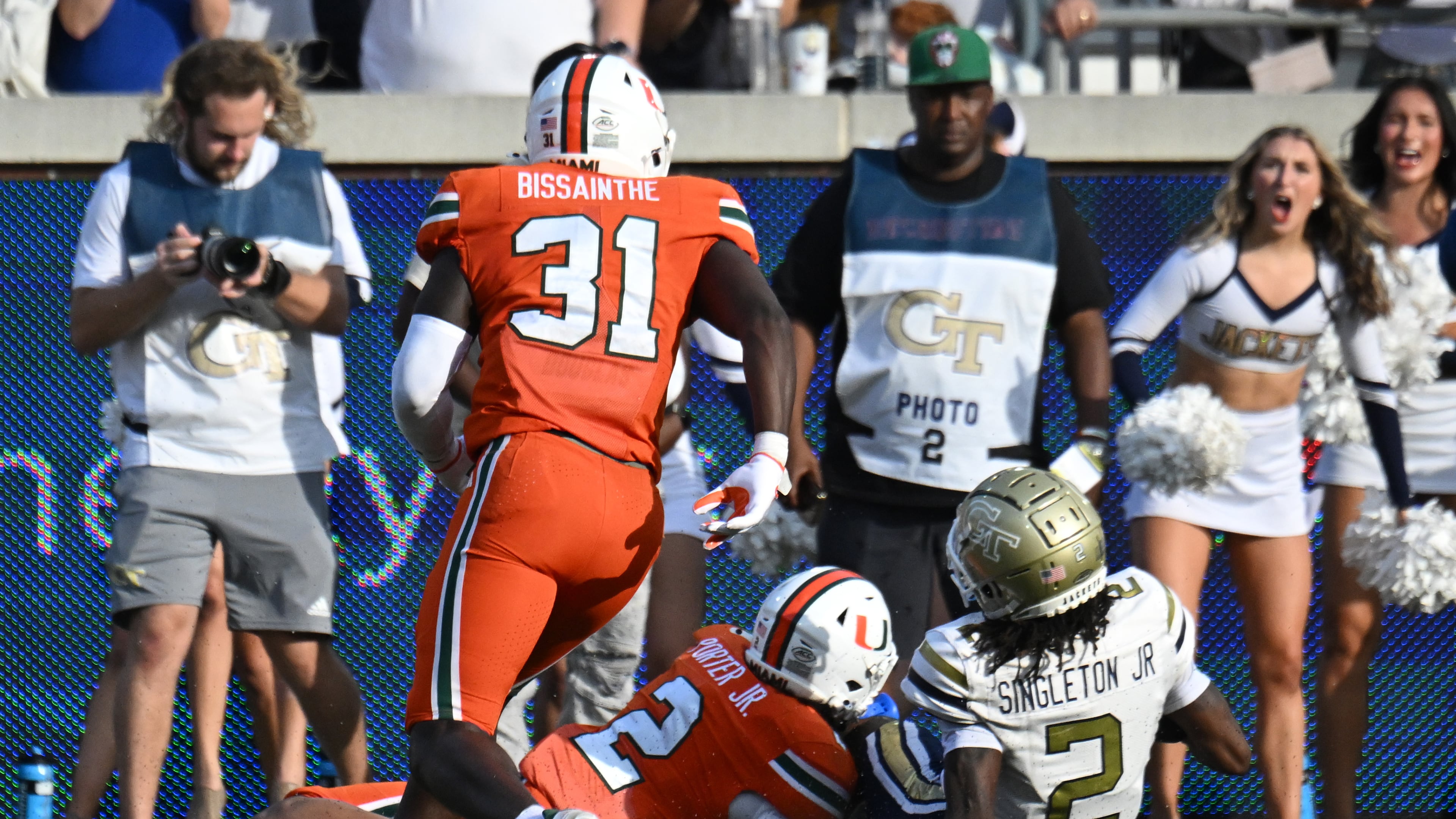 Georgia Tech wide receiver Eric Singleton Jr. (2) slides down in front of Miami defensive back Daryl Porter Jr. (2) at the end of the fourth quarter in an NCAA college football game at Georgia Tech's Bobby Dodd Stadium, Saturday, November 9, 2024, in Atlanta. Georgia Tech won 28-23 over Miami. (Hyosub Shin / AJC)