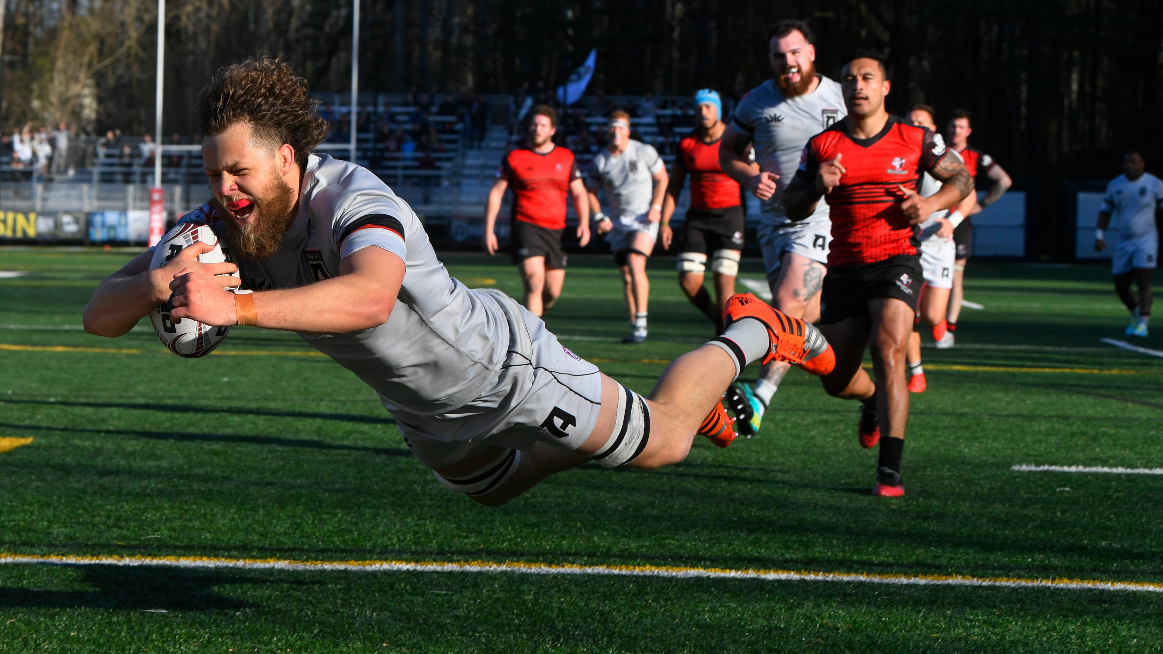 Marno Redelinghuys dives to score in Rugby ATL's inaugural game against Utah Sunday, Feb. 9, 2020, at Lupo Family Field in Marietta. Atlanta's franchise is playing its first season in the in the 3-year-old Major League Rugby. Atlanta won 28-19.