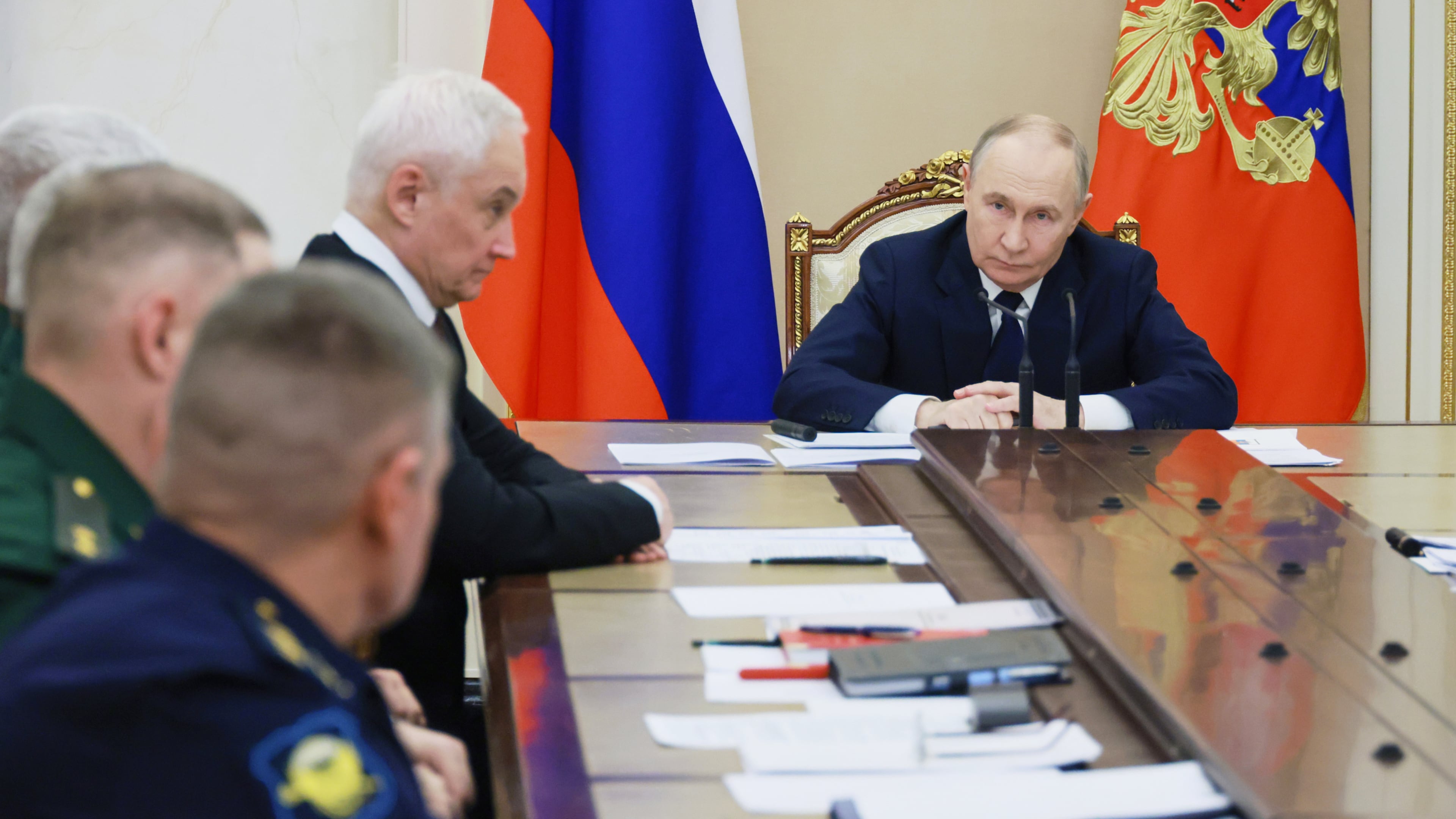 FILE - Russian President Vladimir Putin, right, attends a meeting with senior military officers as Russian Defense Minister Andrei Belousov, fourth left, sits near at the Kremlin in Moscow, Russia, Dec. 29, 2025. (Mikhail Metzel/Sputnik, Kremlin Pool Photo via AP, File)