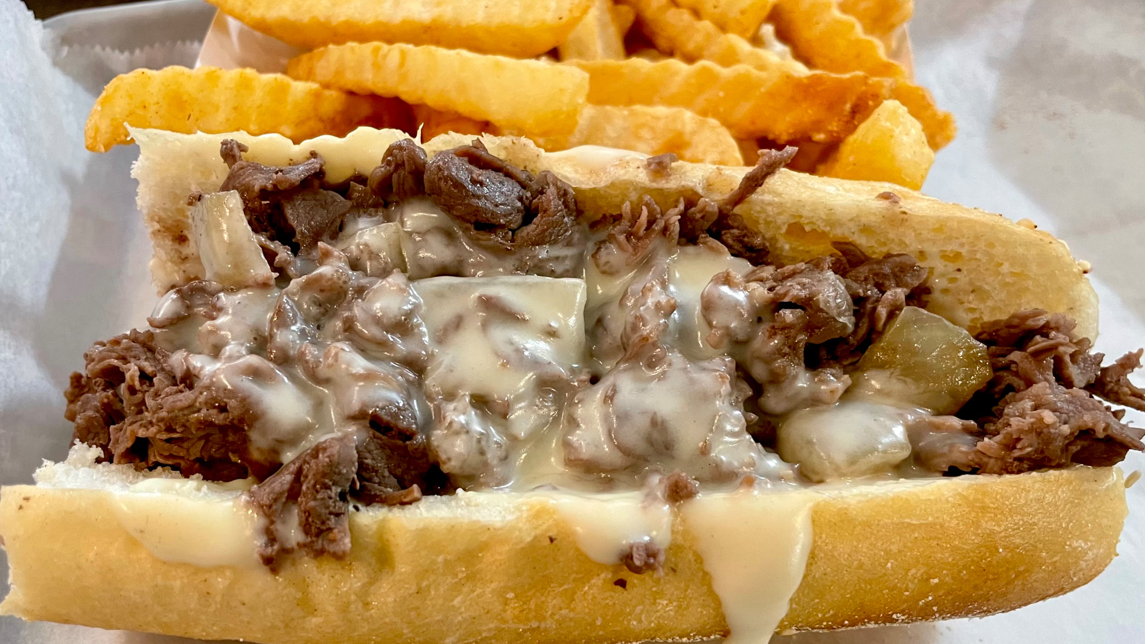 The menu at Nicky's Undefeated advises that, "when in doubt," the Founders Special is the cheesesteak of choice. (Angela Hansberger for the AJC)