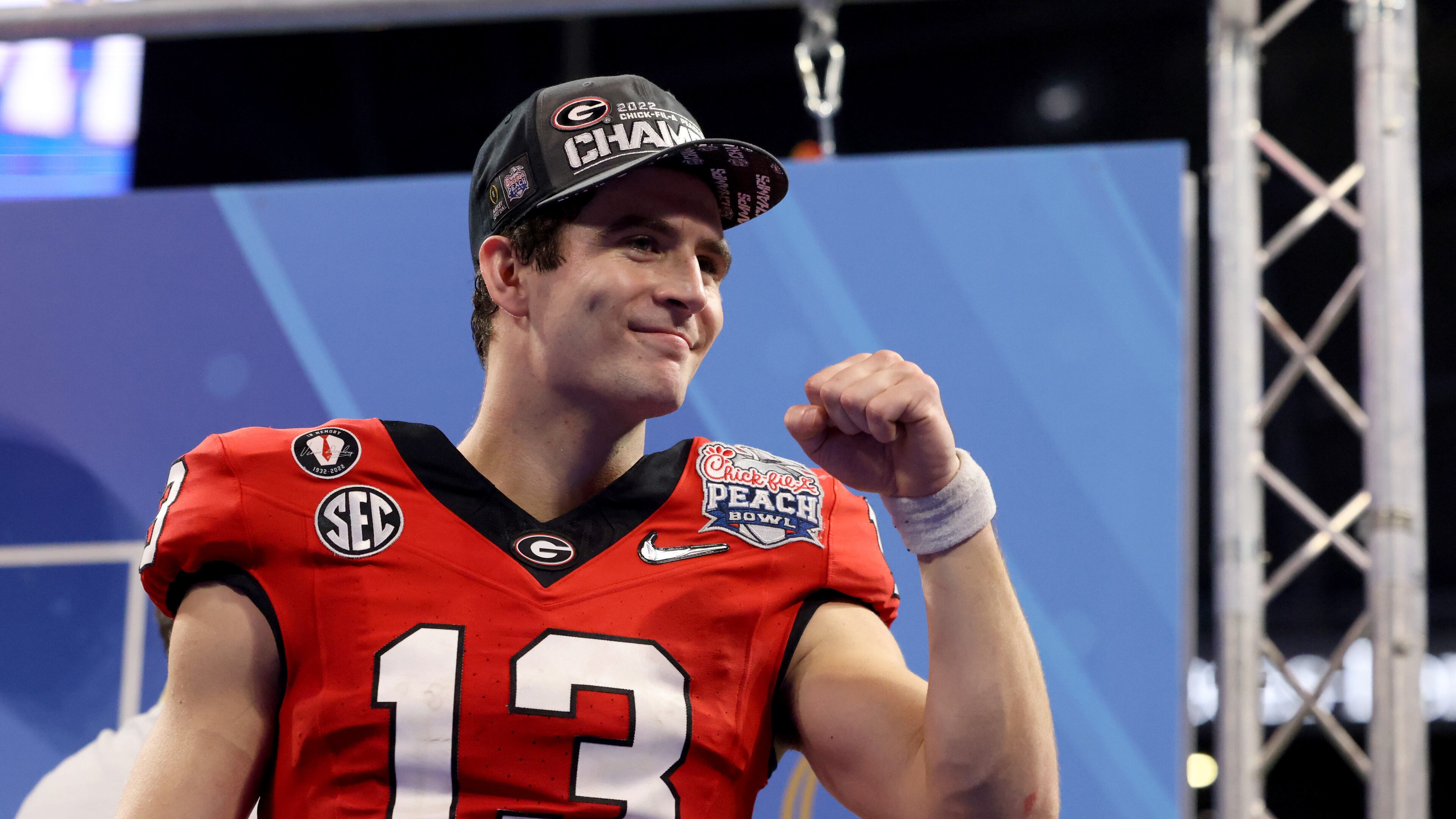 Georgia quarterback Stetson Bennett celebrates after Georgia’s 42-41 win against Ohio State in the Peach Bowl Playoff Semifinal, at Mercedes-Benz Stadium, Sat., Dec. 31, 2022, in Atlanta. (Jason Getz / Jason.Getz@ajc.com)